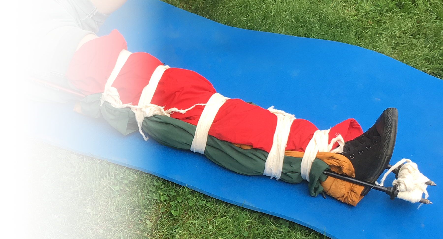 Splint of a leg on the ground on blue pad