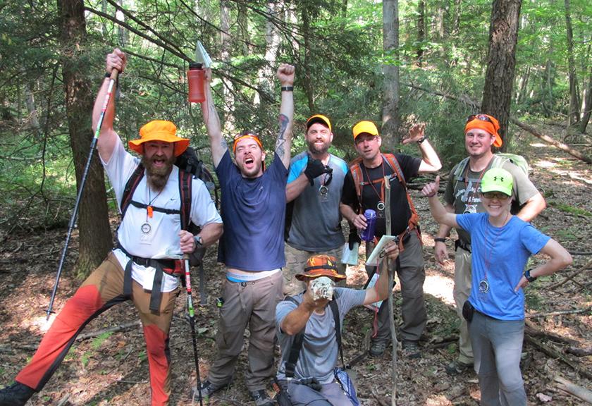 Group hiking in woods