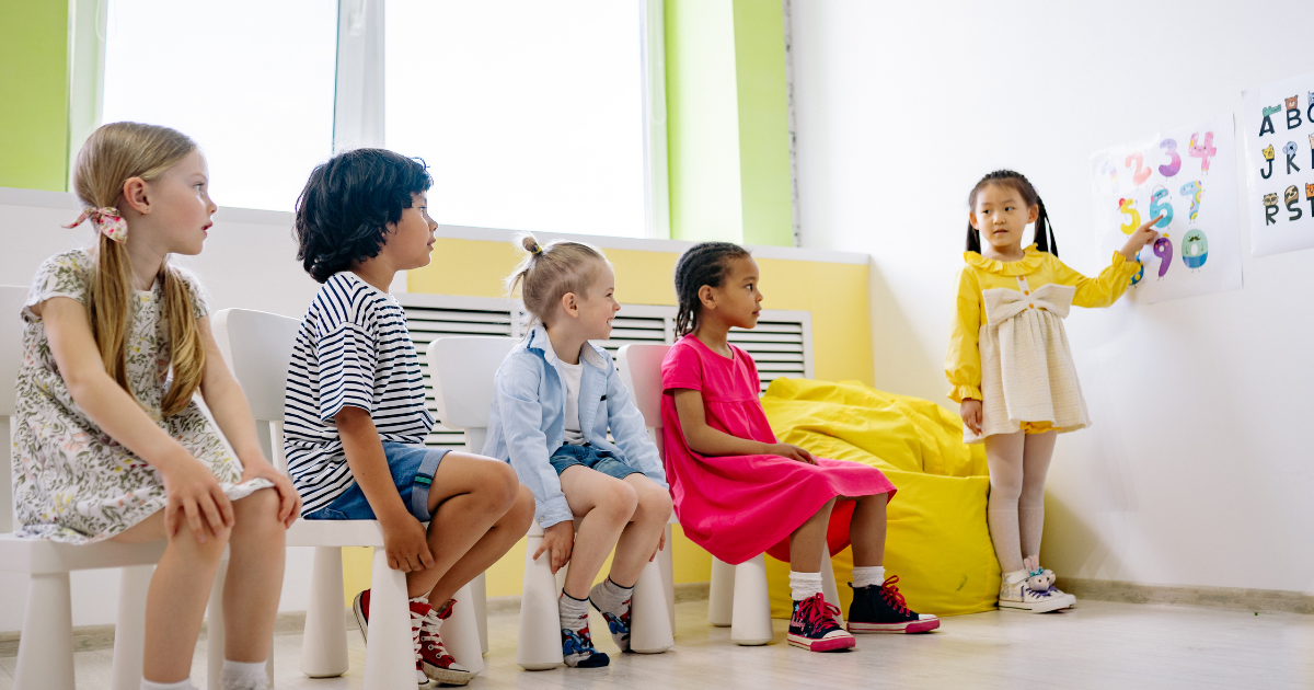 Children teaching each other.