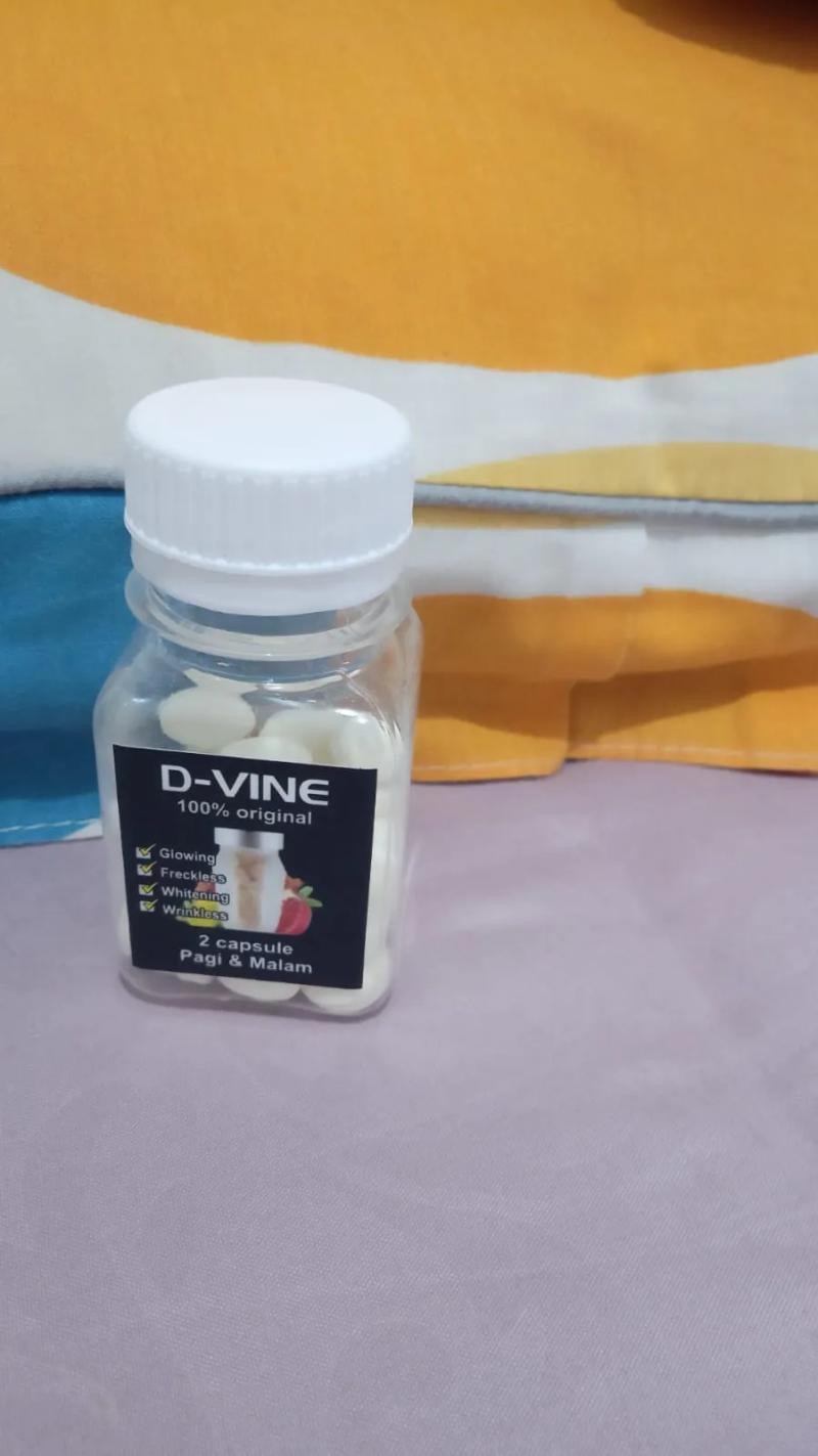 Contoh DVN Collagen palsu dalam botol plastik kecil dengan label hitam D-VINE — perhatikan perbedaannya