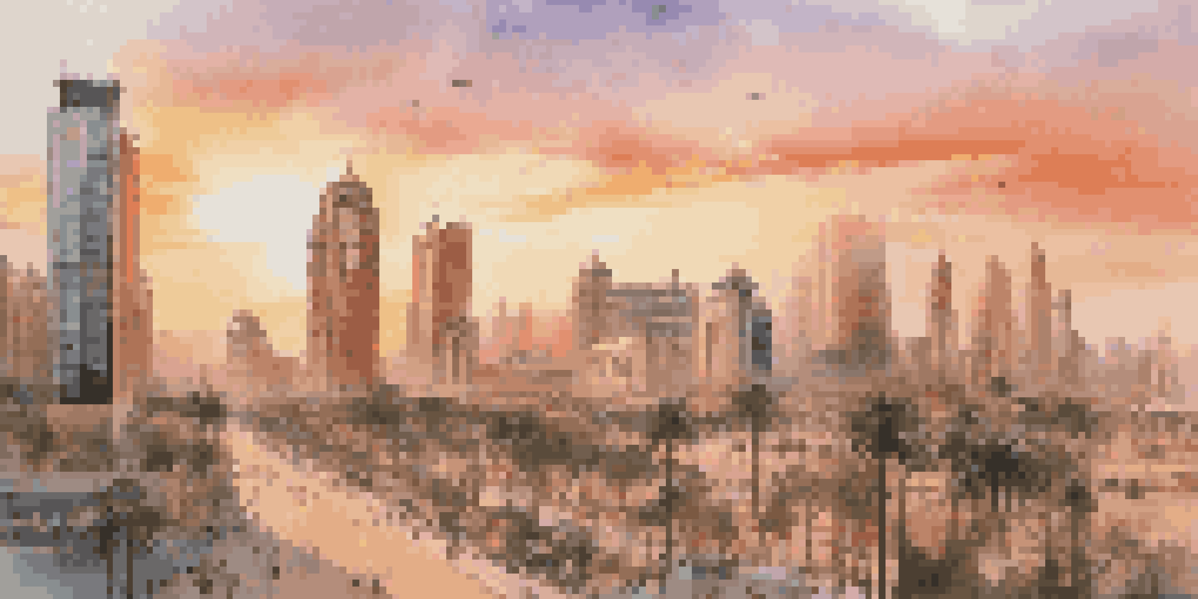 A sunset view of a modern Middle Eastern city skyline with skyscrapers and palm trees in the foreground.