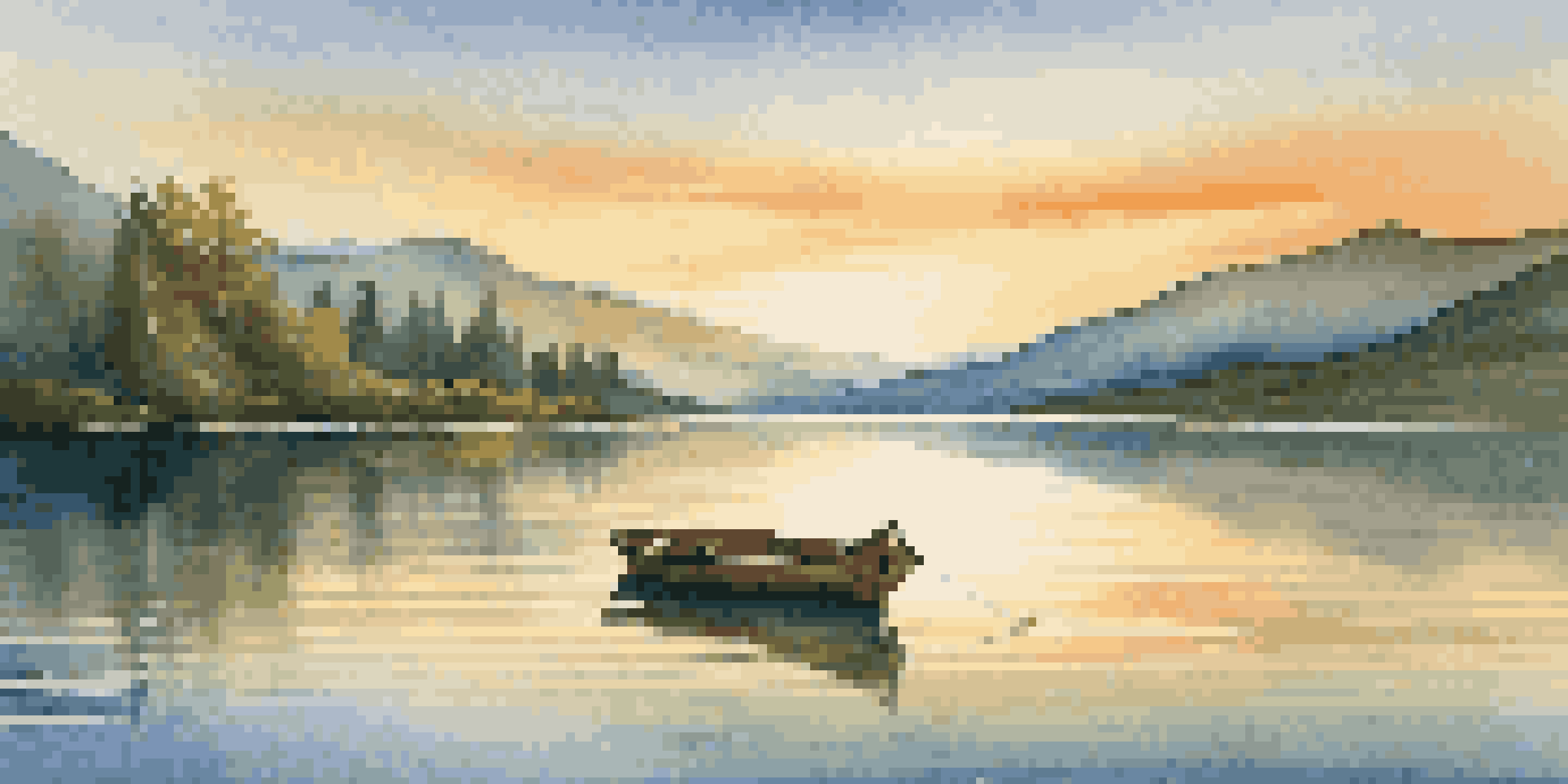 A tranquil lake scene with mountains, a wooden boat, and a sunset sky.