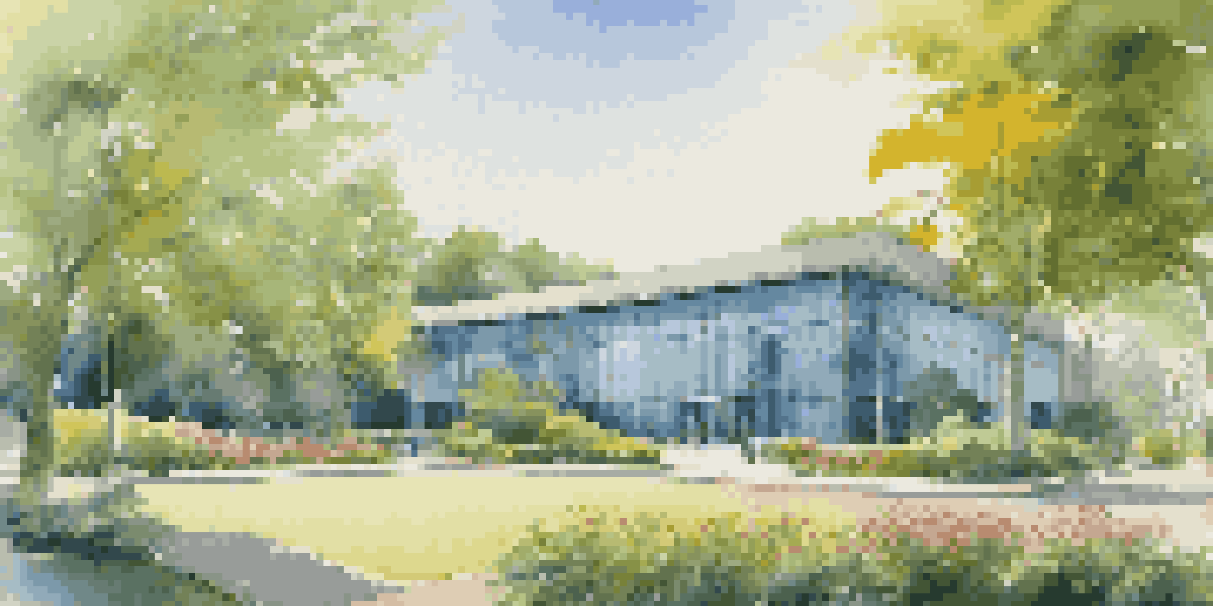 A modern office building set in a green landscape with people discussing outside.