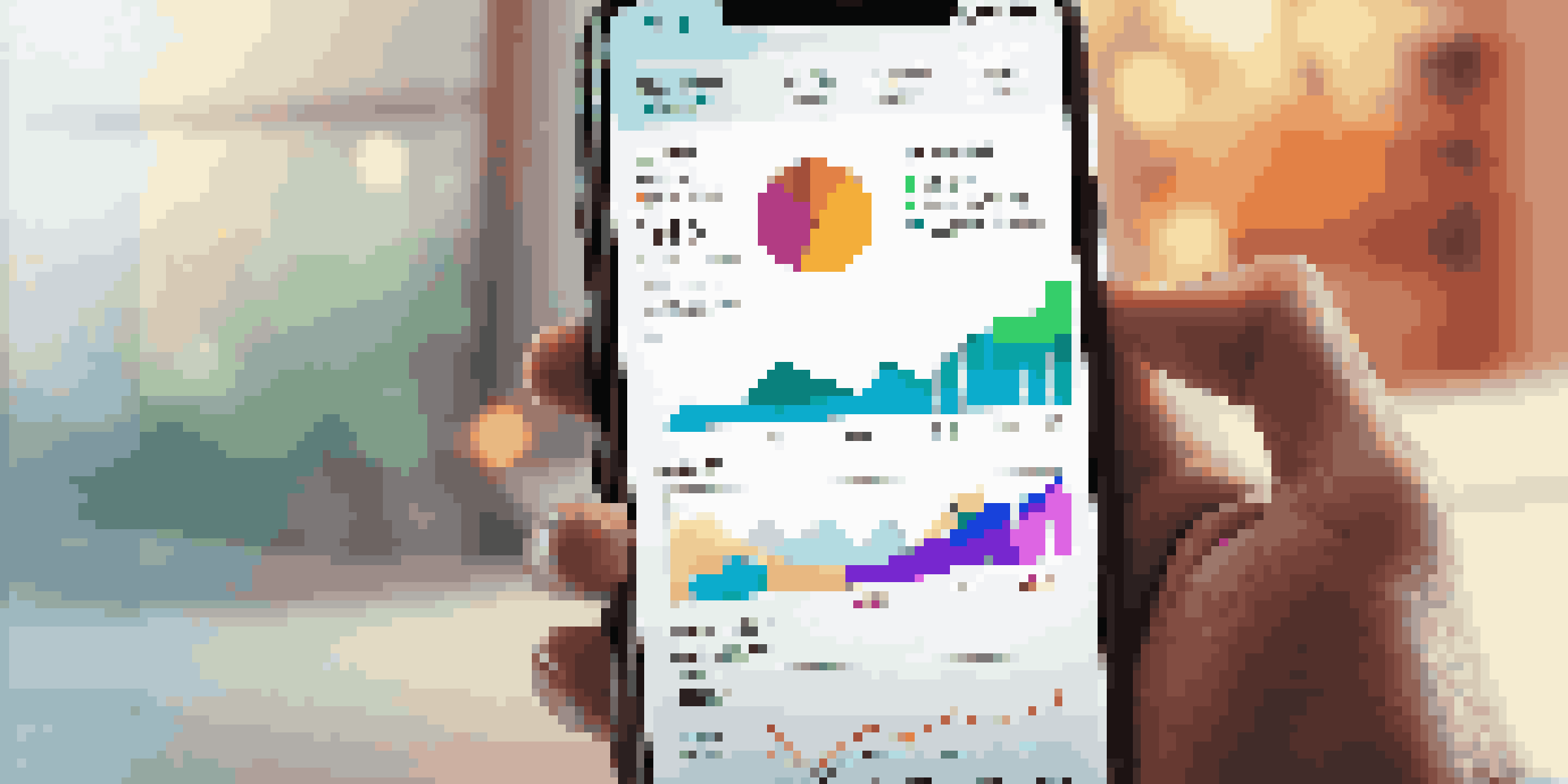 A smartphone displaying a digital wealth management app with colorful graphs and charts, set against a softly blurred background.