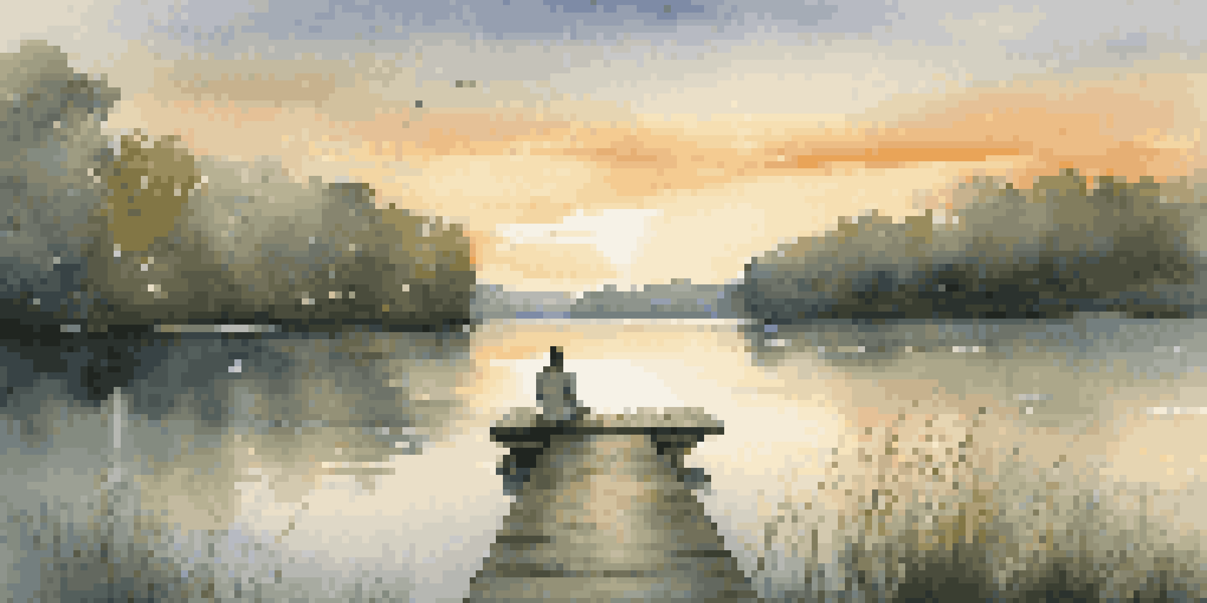 A peaceful lake at sunset with a wooden dock and a person sitting at the edge, surrounded by greenery.