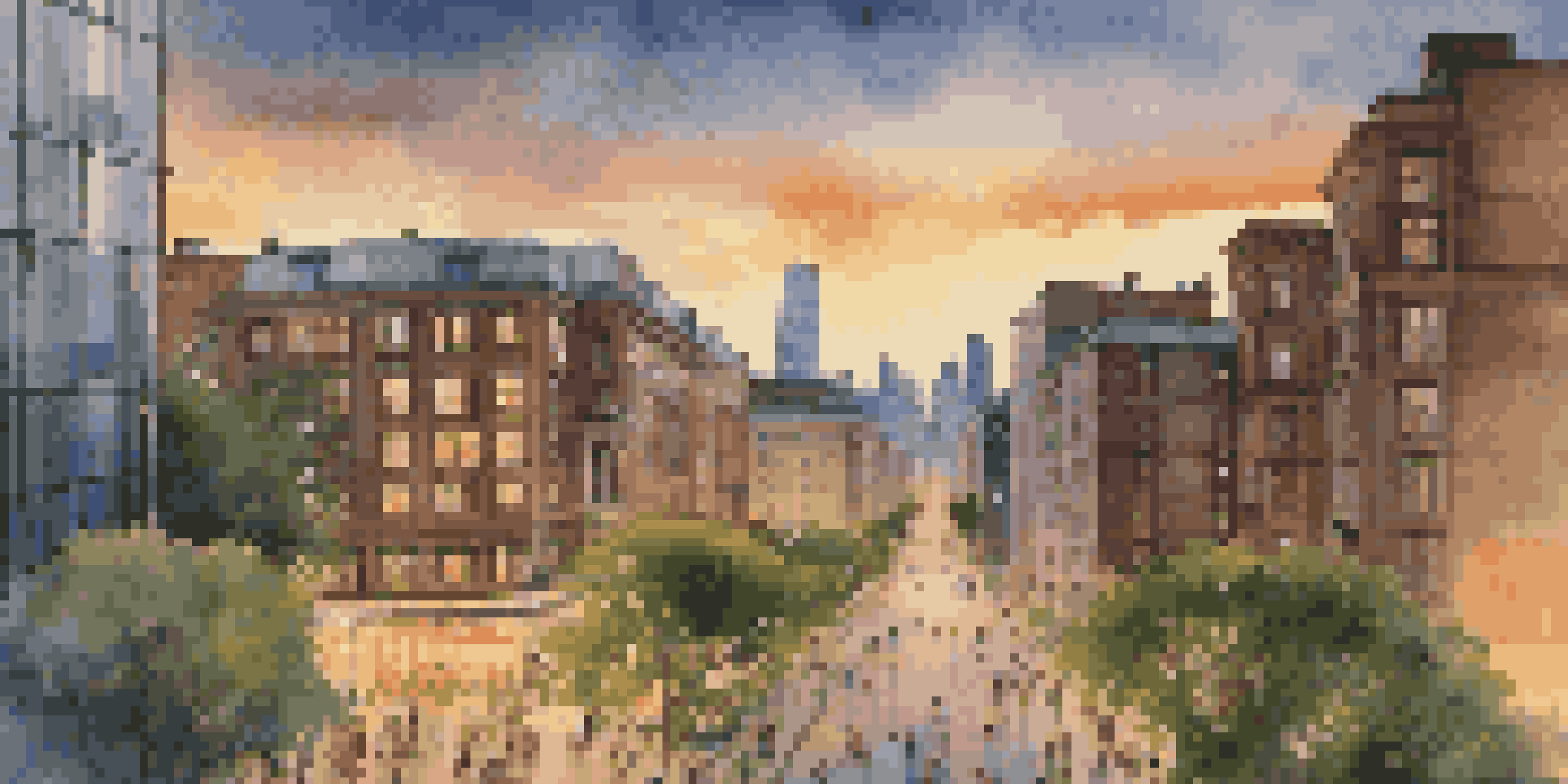 A city skyline at dusk with modern buildings and historic architecture, illuminated streets, and people walking.