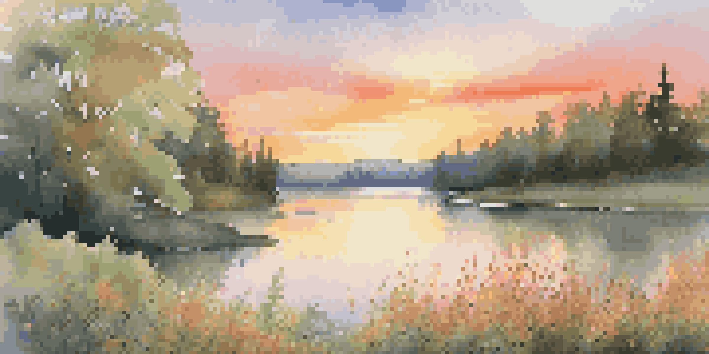 A beautiful sunrise over a calm lake surrounded by trees and wildflowers, showcasing warm colors in the sky.