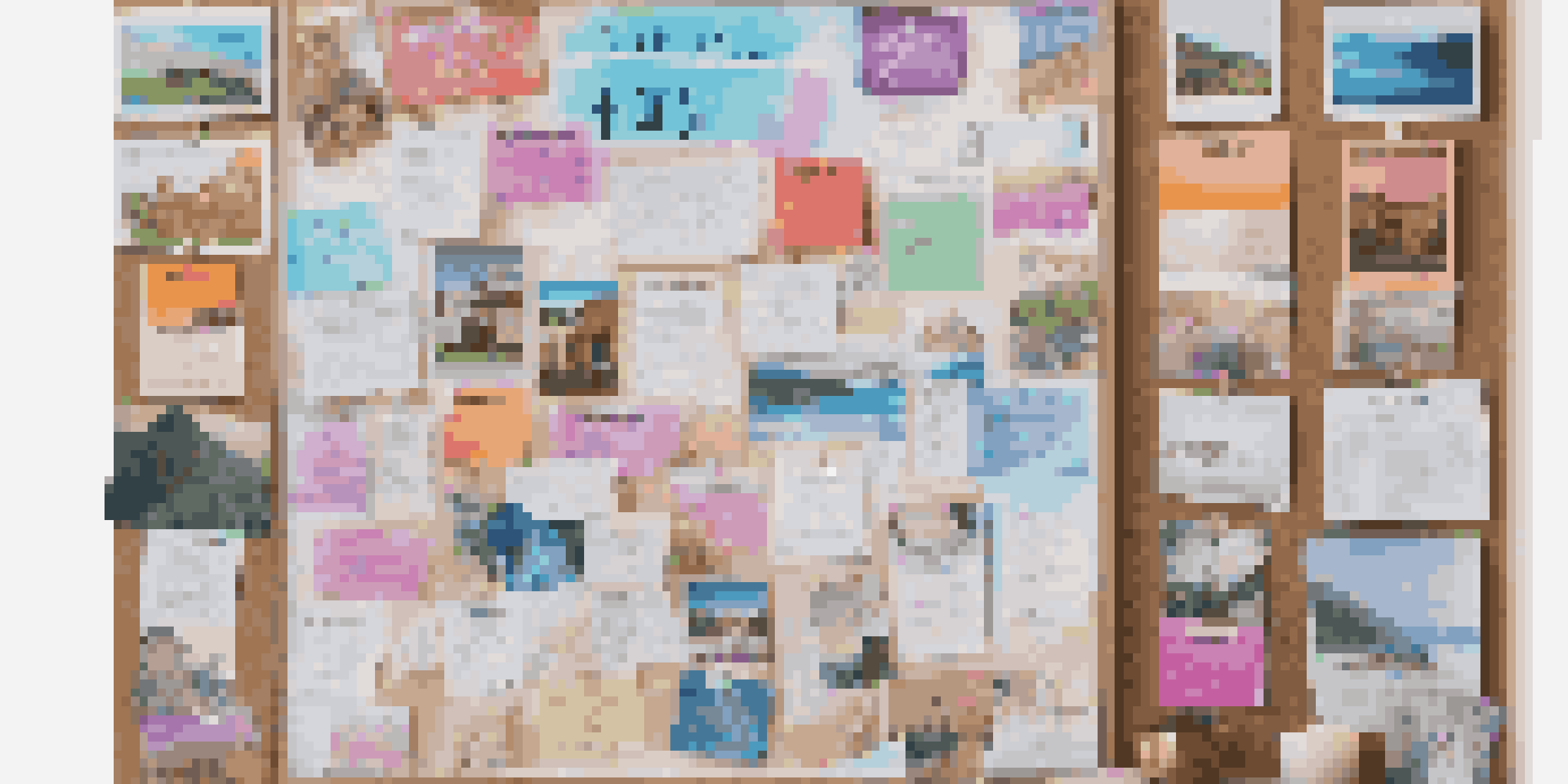 A corkboard filled with colorful images and quotes representing financial goals, illuminated by soft natural light.