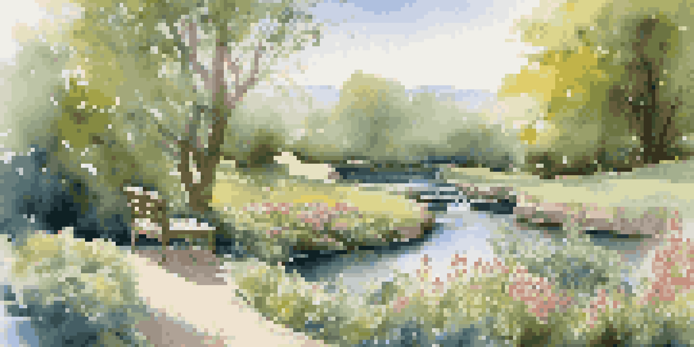 A peaceful garden with colorful flowers, a wooden bench, and a stream under a clear sky.