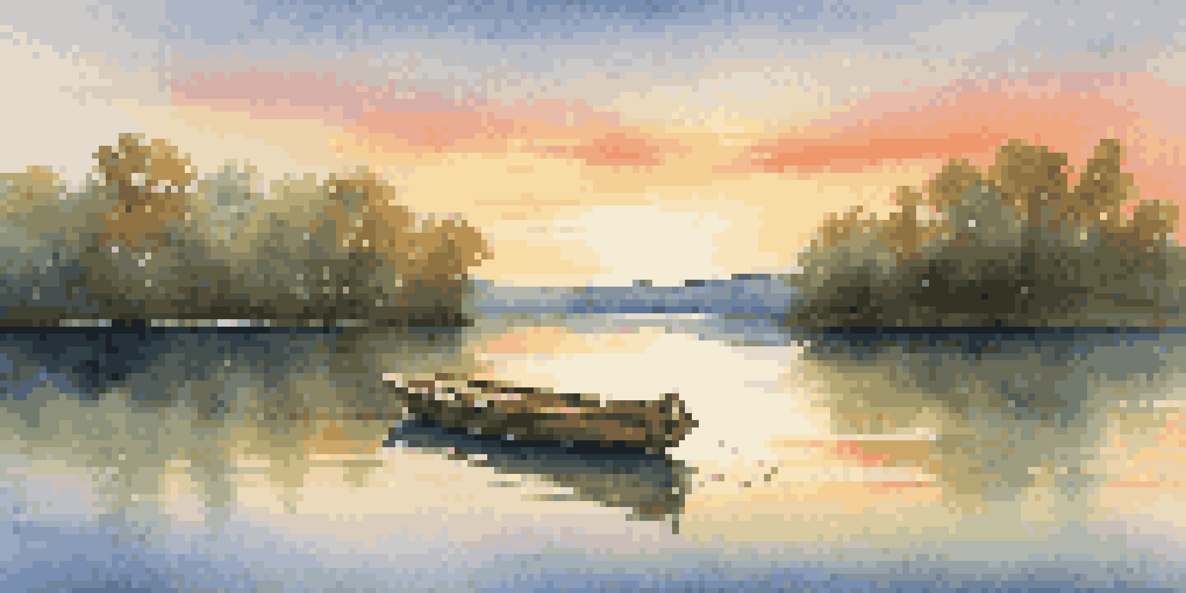A peaceful lake at sunset surrounded by trees and a small boat, with warm colors reflecting on the water.