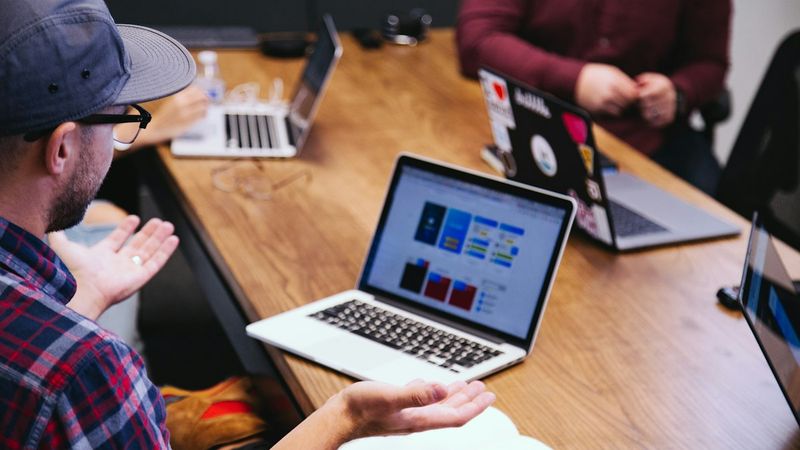People talking together in a meeting room