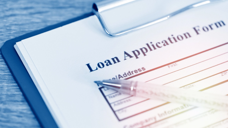 A close up shot of loan application form. 