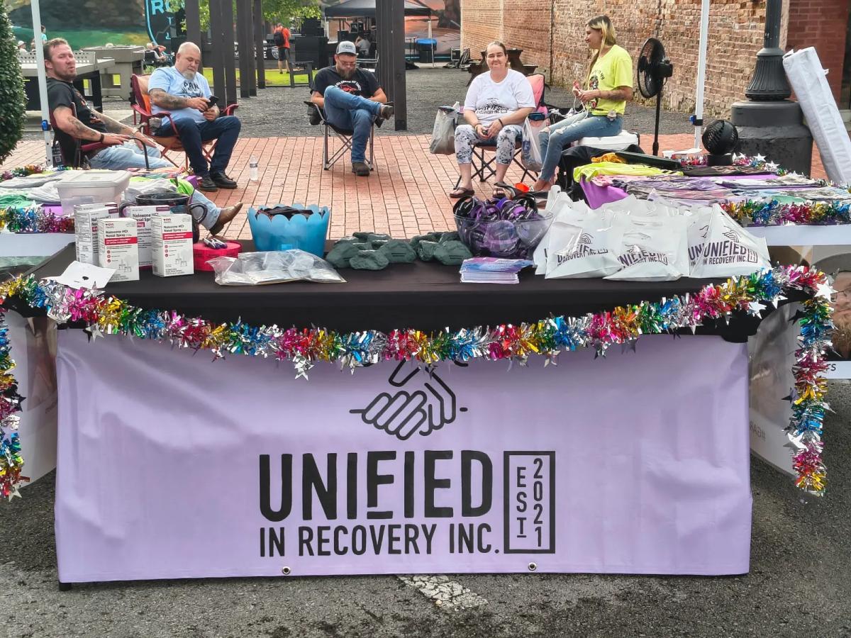 Unified in Recovery community members at a community event