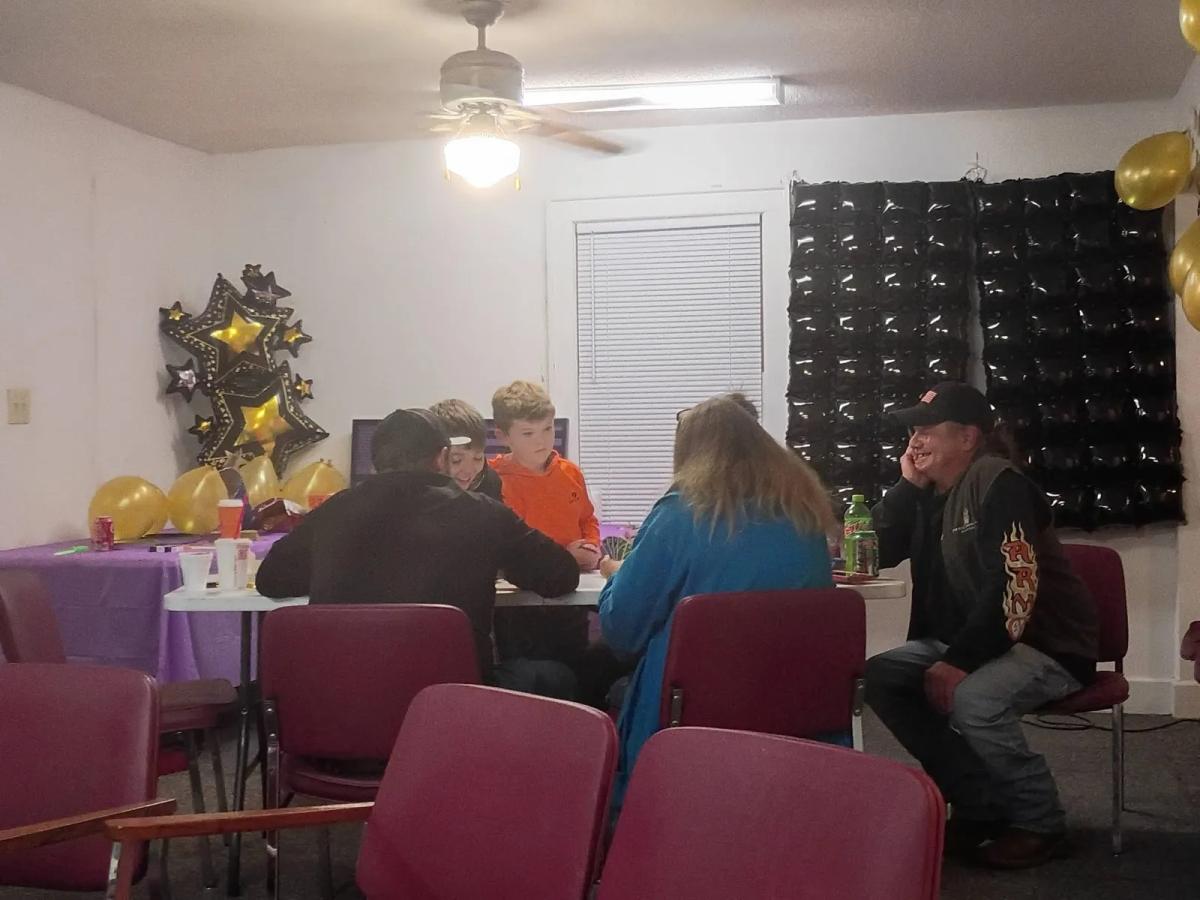 Unified in Recovery community members at a community event