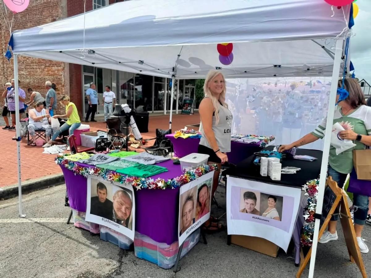Unified in Recovery community members at a community event