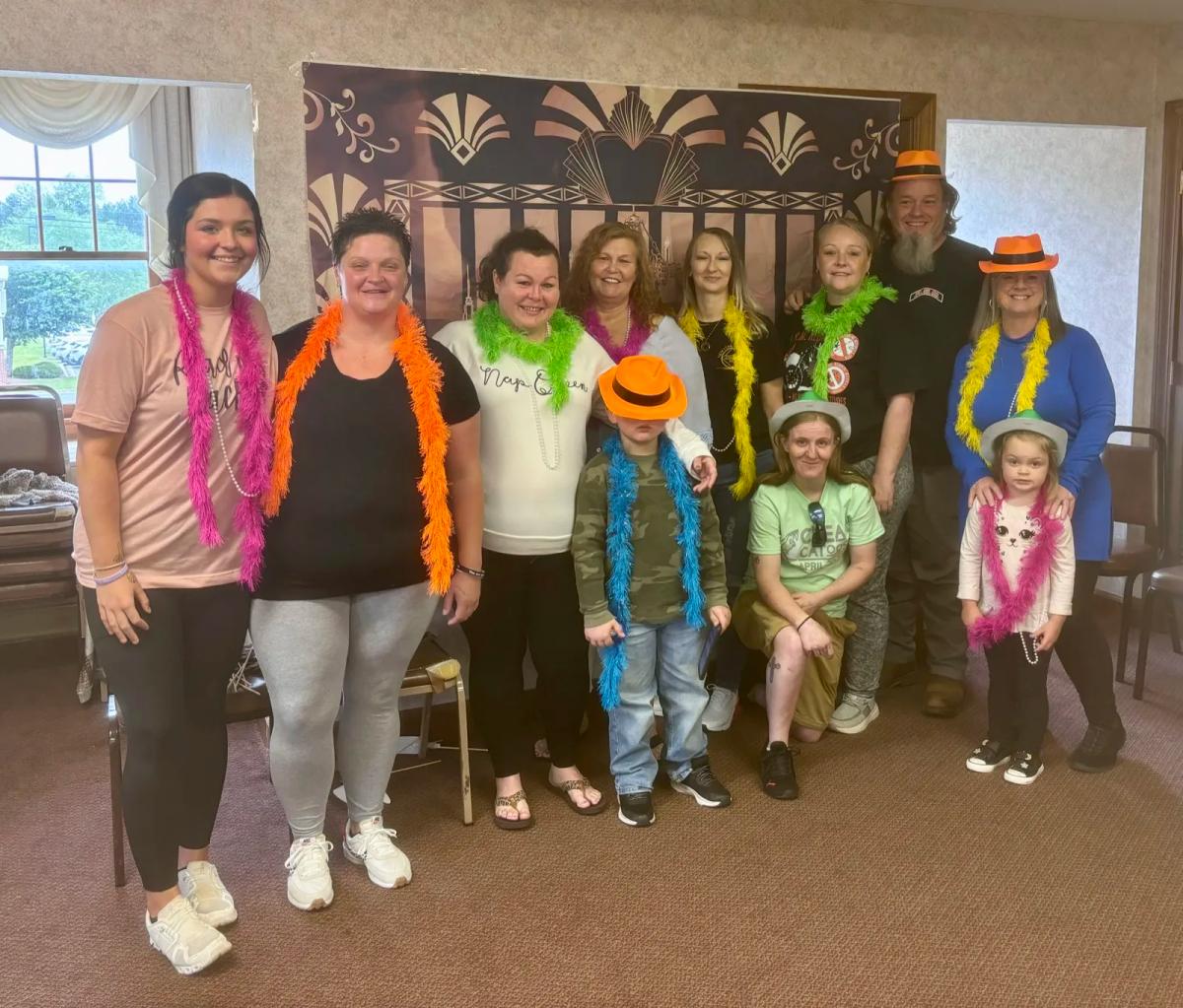 Unified in Recovery community members at a community event
