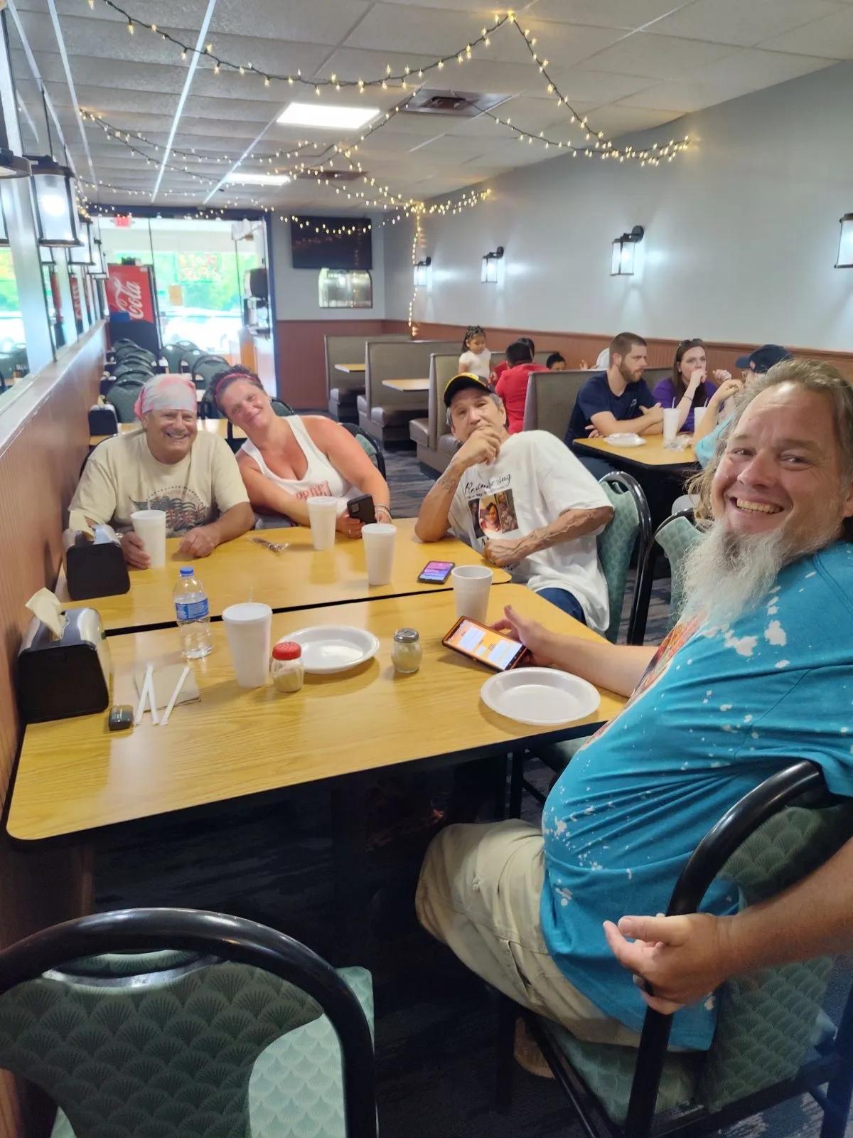 Unified in Recovery community members at a community event