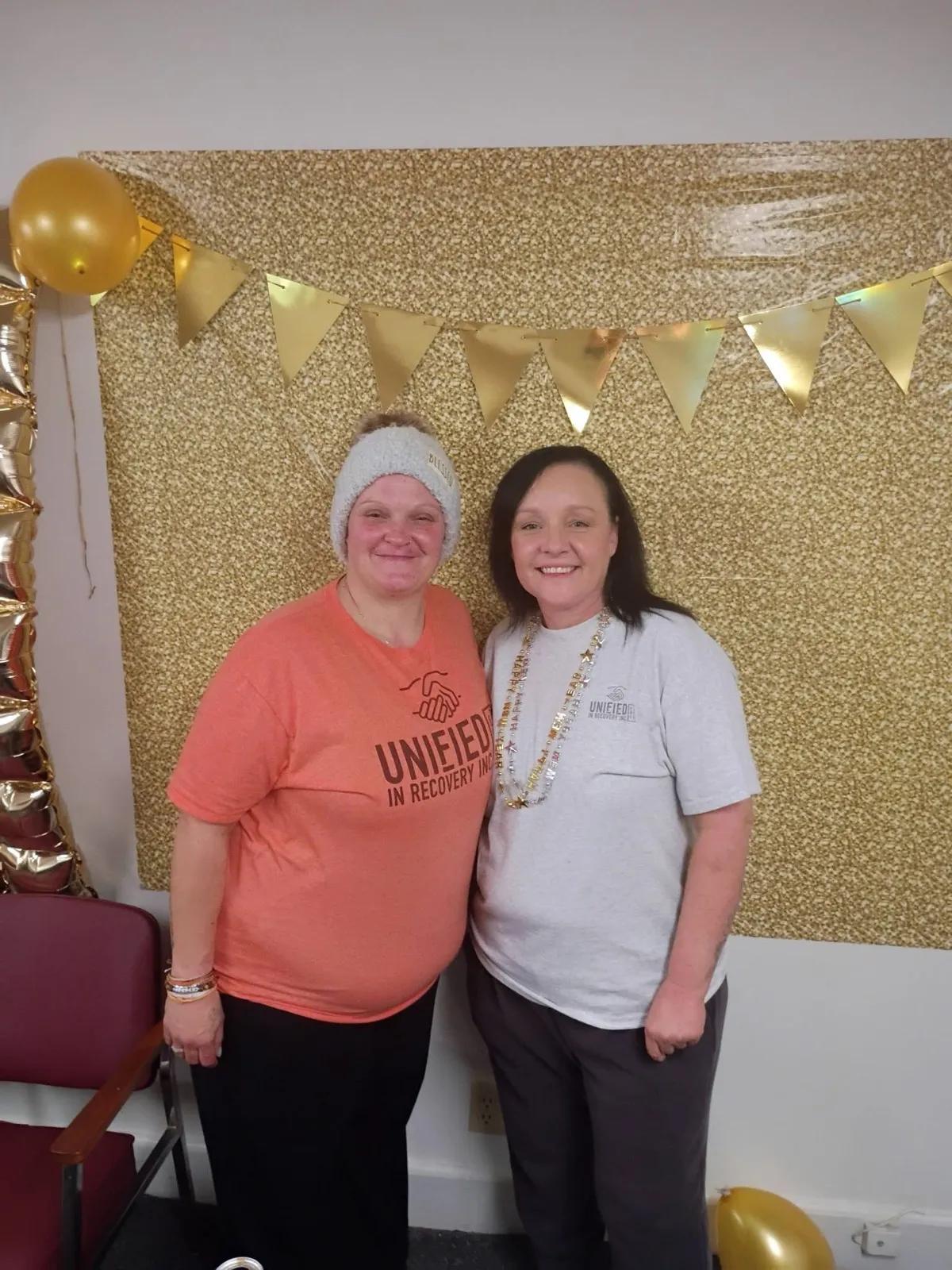 Unified in Recovery community members at a community event