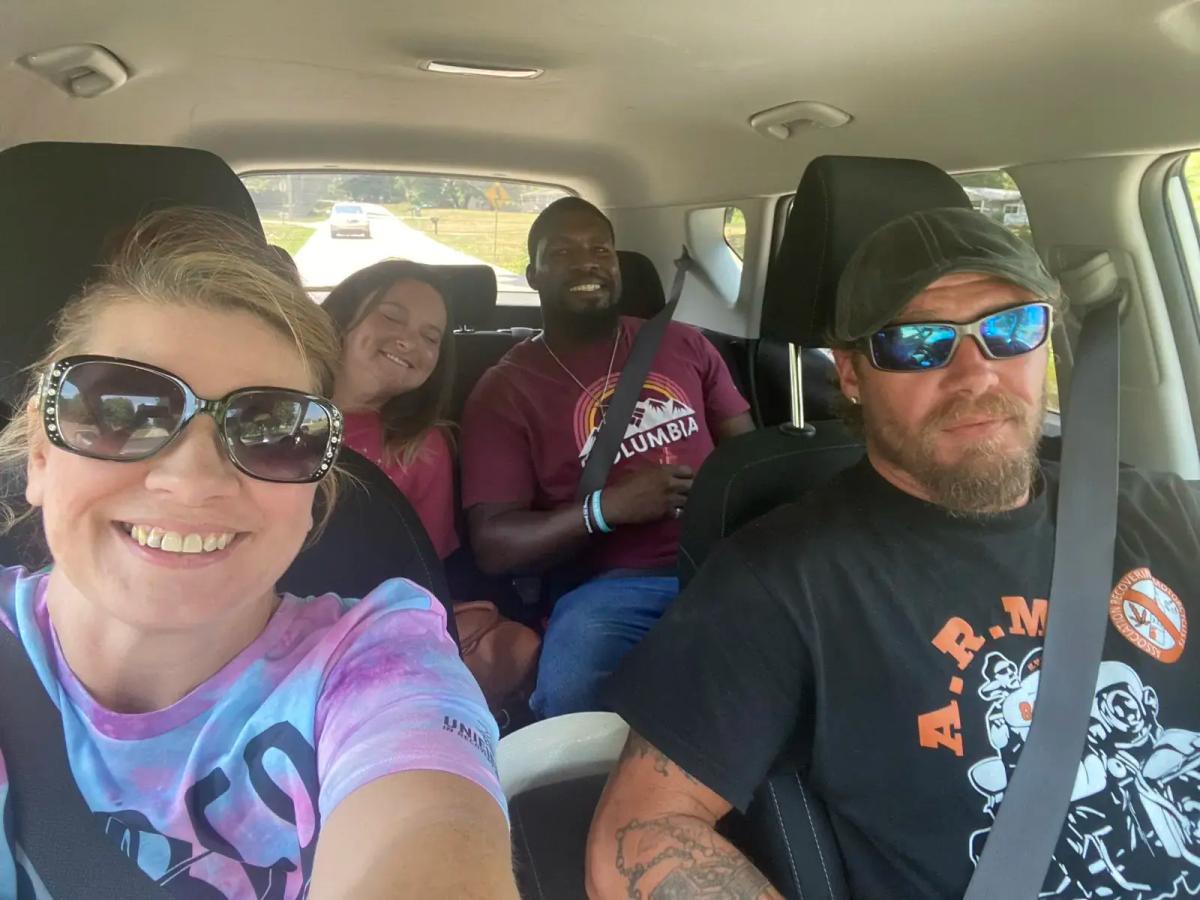 Unified in Recovery community members at a community event