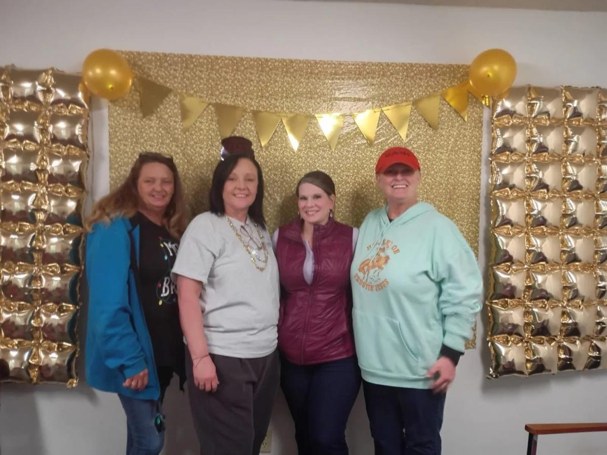Unified in Recovery community members at a community event