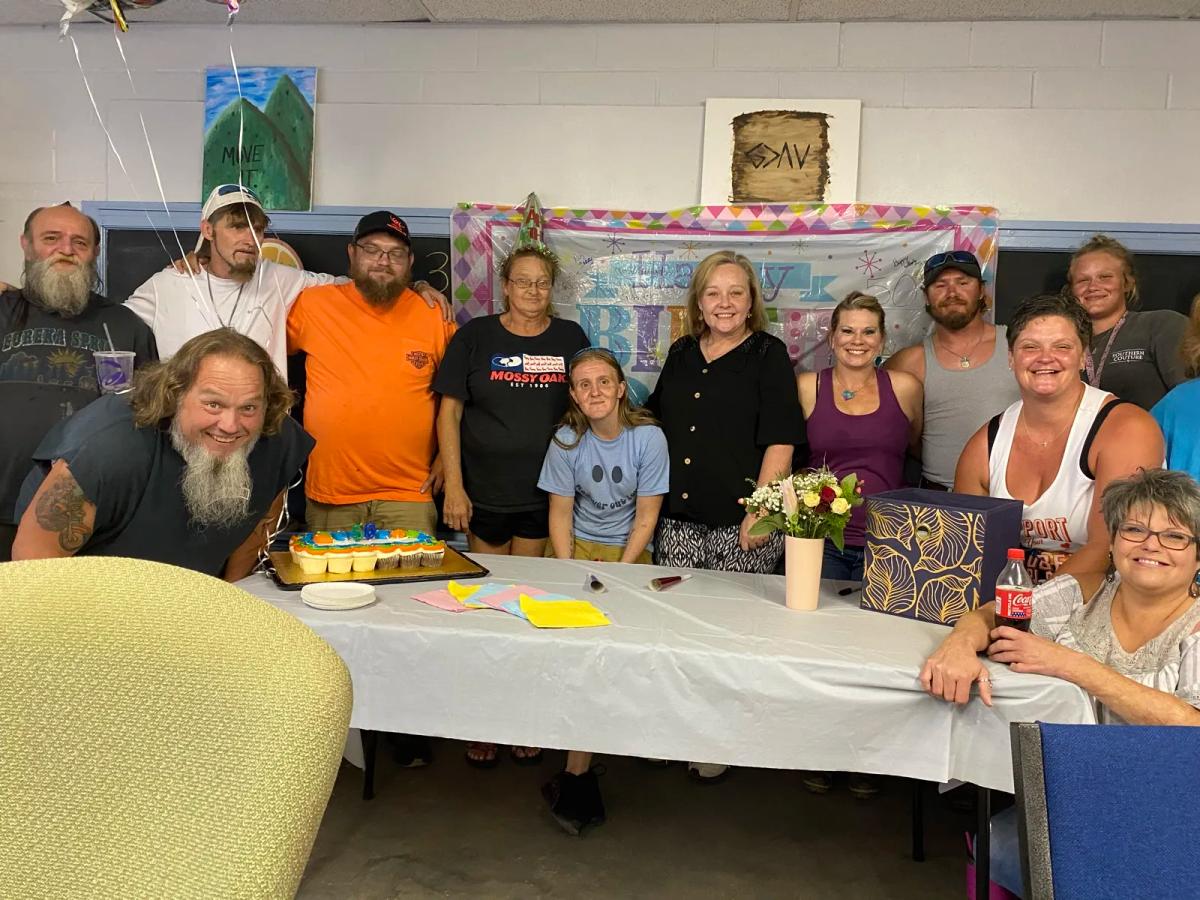 Unified in Recovery community members at a community event