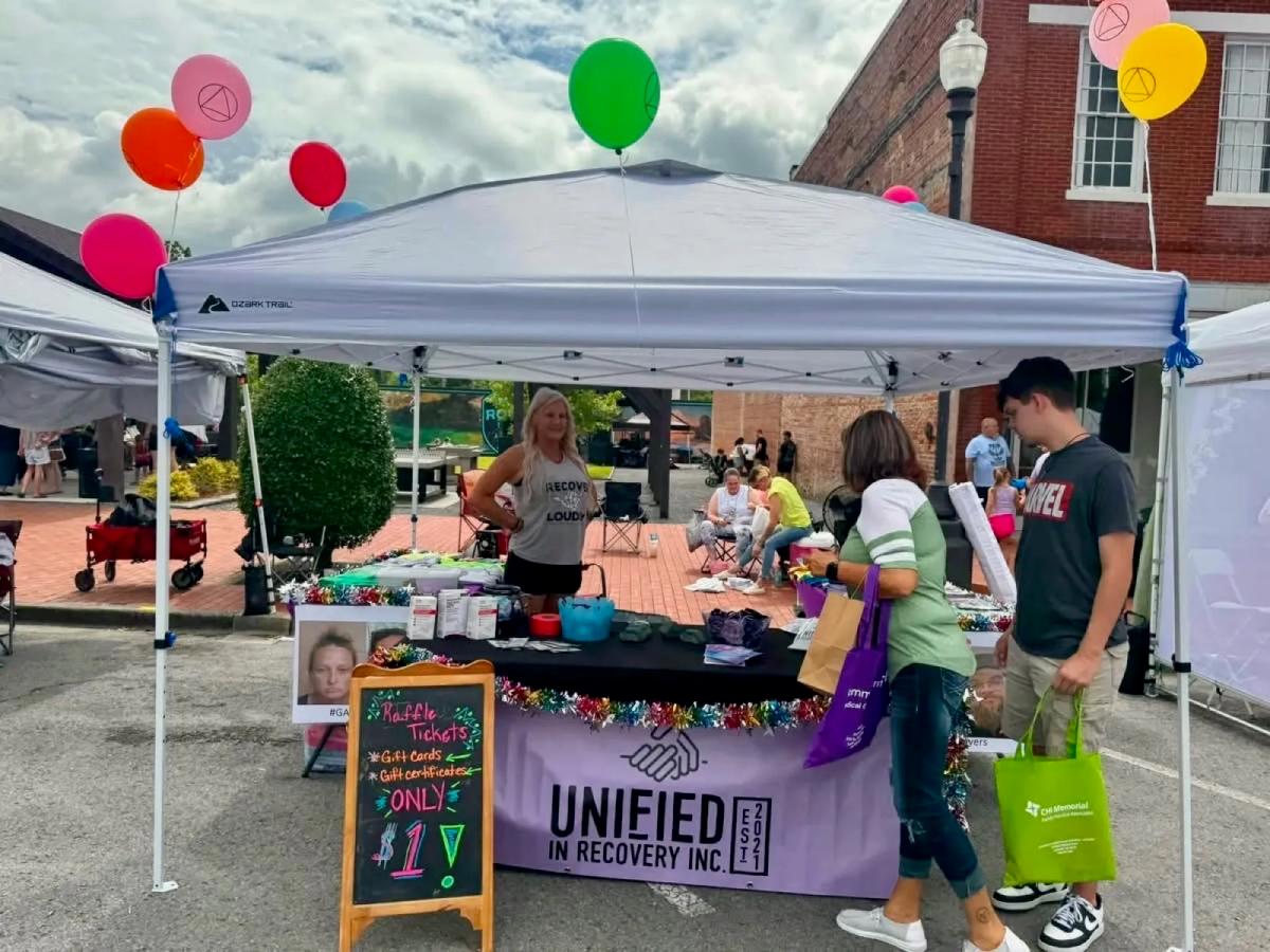 Unified in Recovery community members at a community event