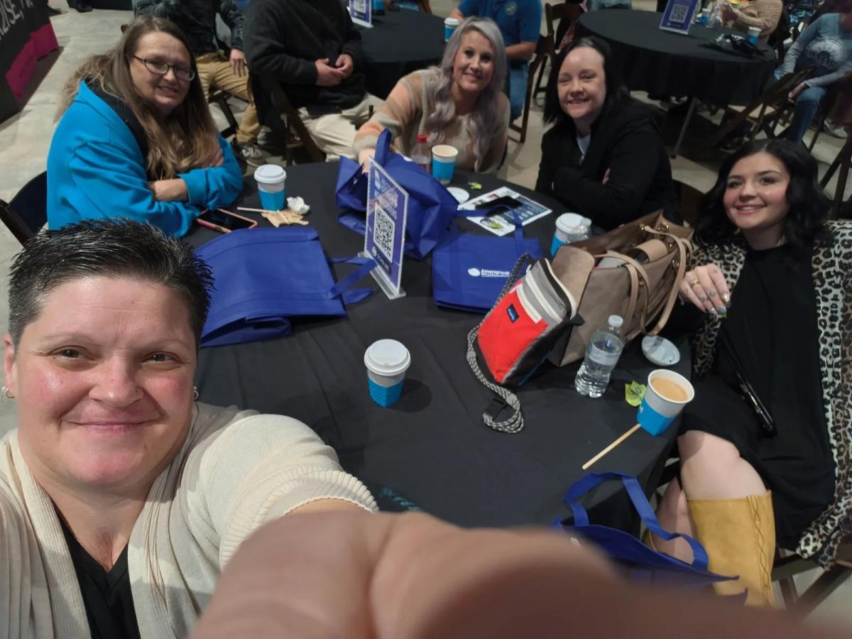 Unified in Recovery community members at a community event