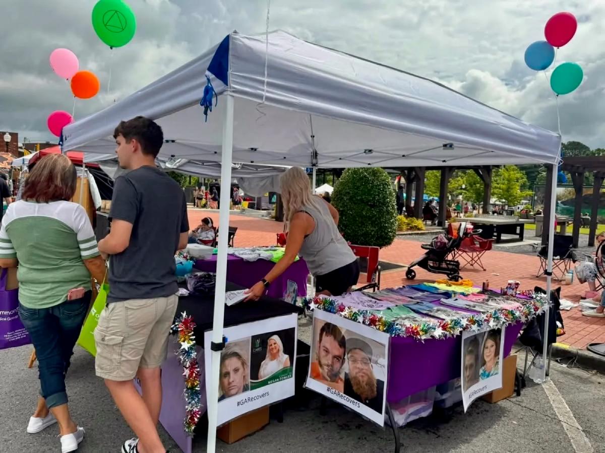 Unified in Recovery community members at a community event
