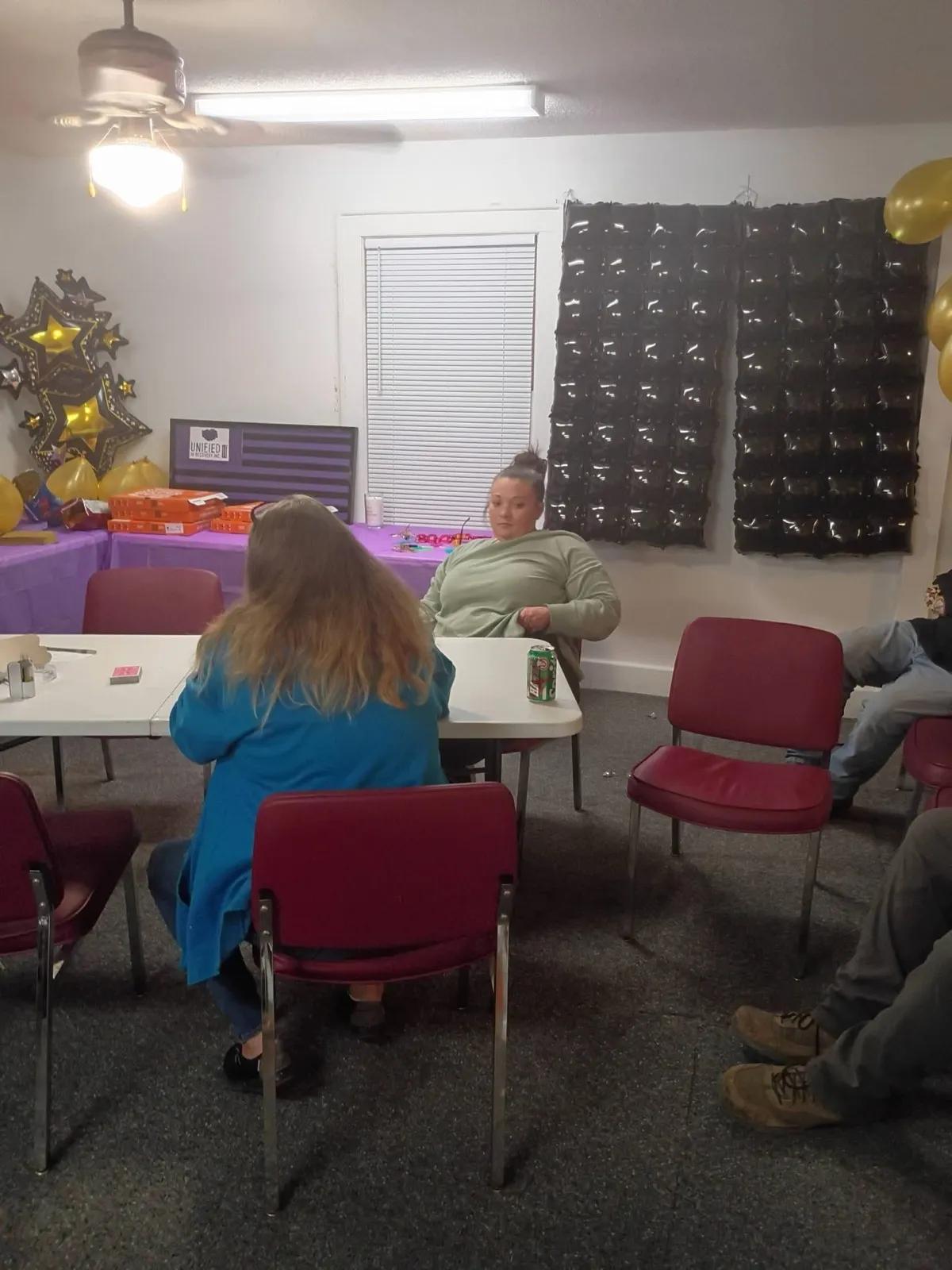 Unified in Recovery community members at a community event