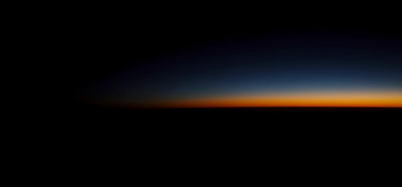 Horizon line seen from space on a black background