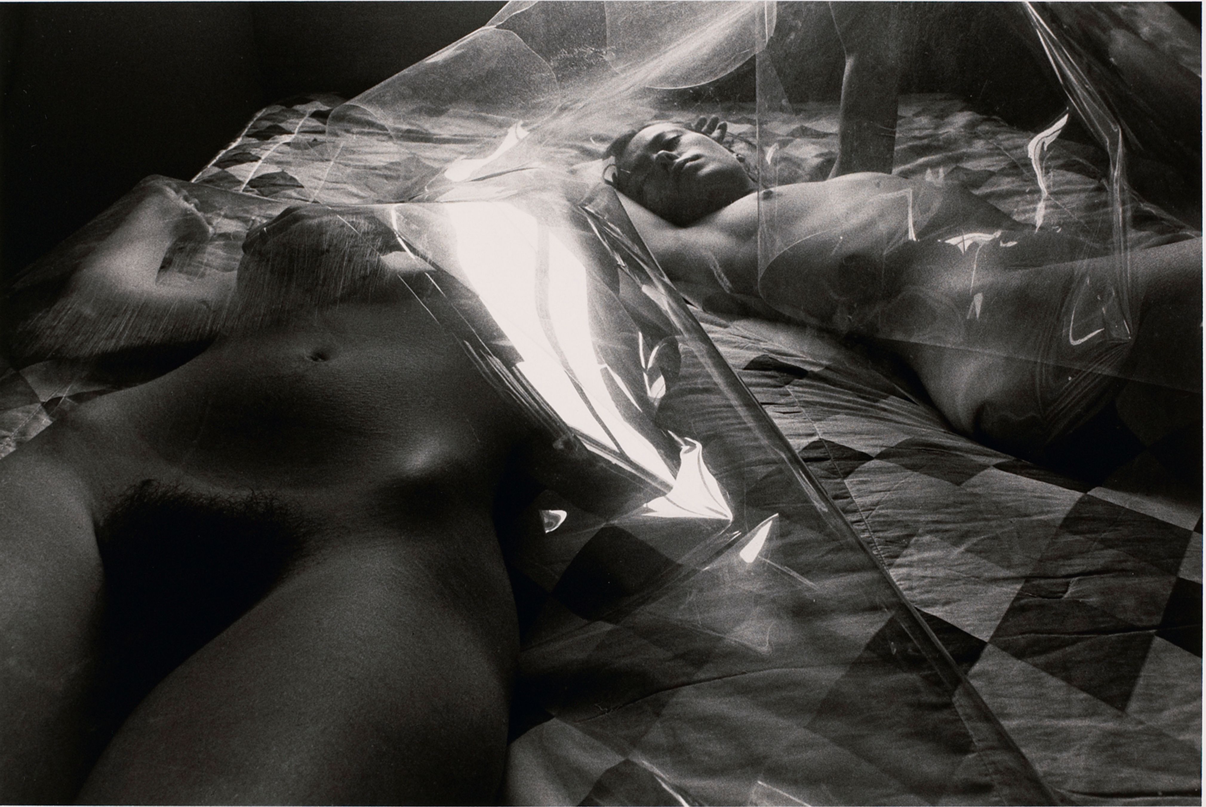 Untitled: Two Women on Bed Under Plastic