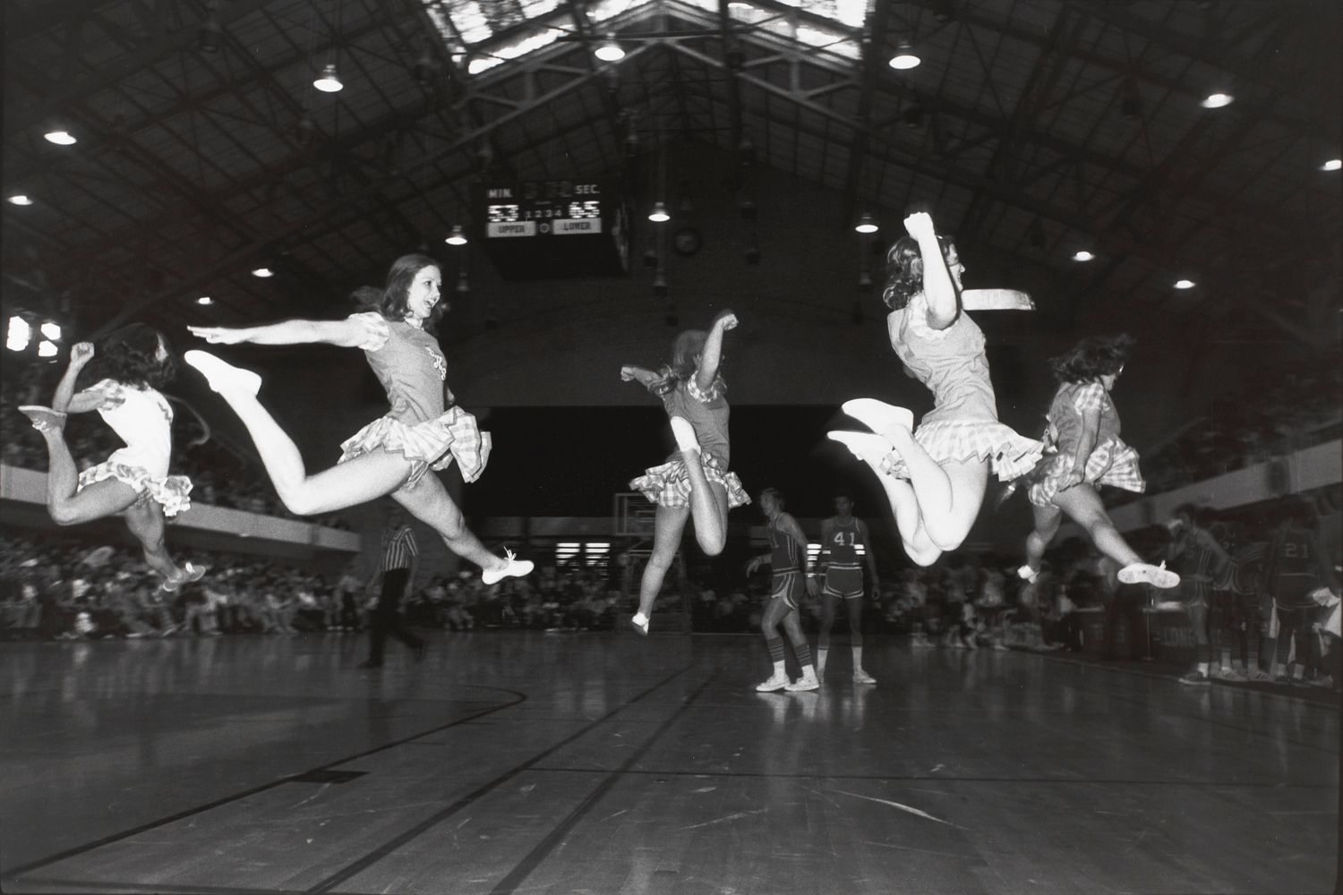 Untitled (Cheerleaders preforming in a gym)