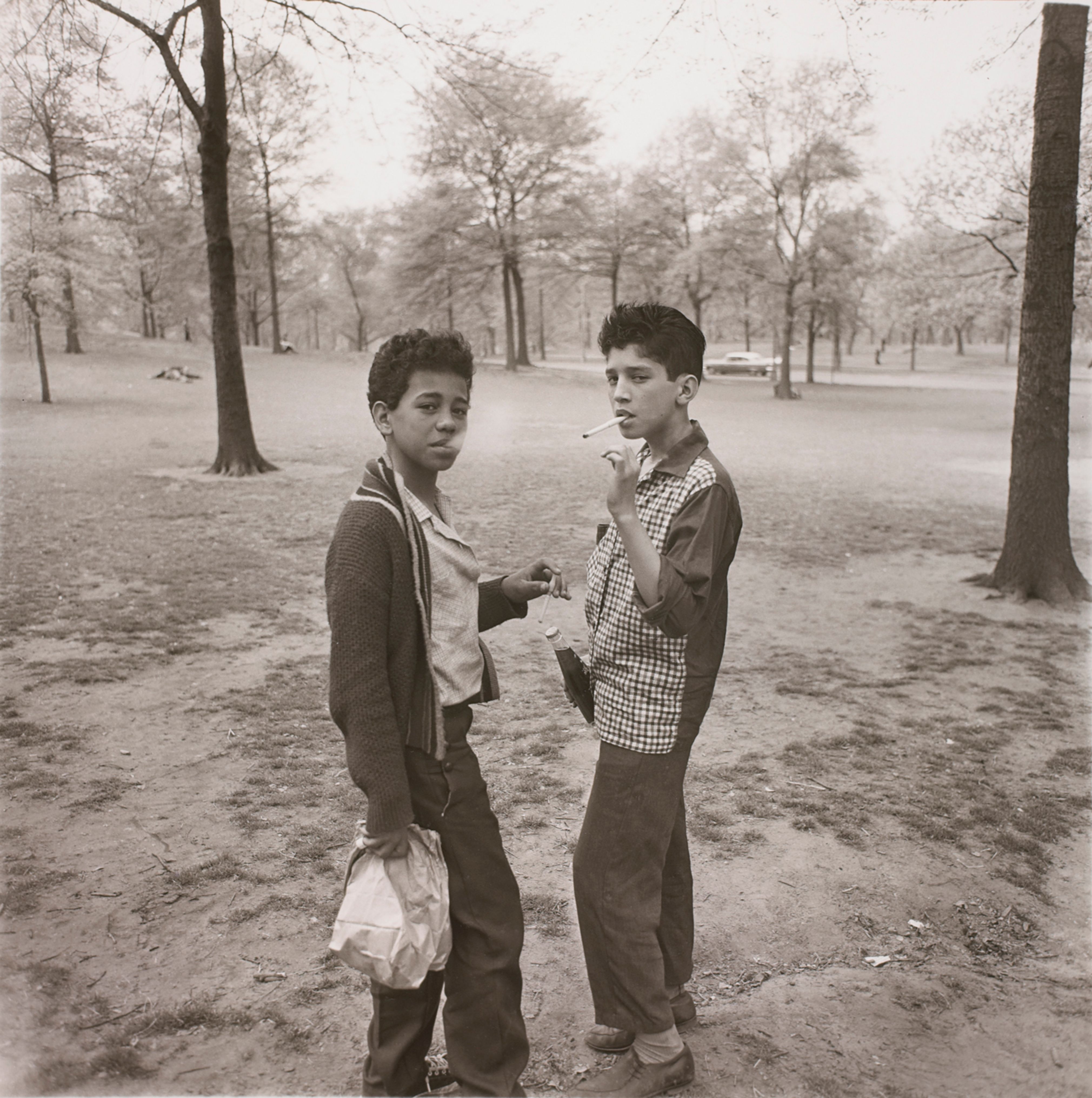 Two boys smoking in Central Park, N.Y.C.