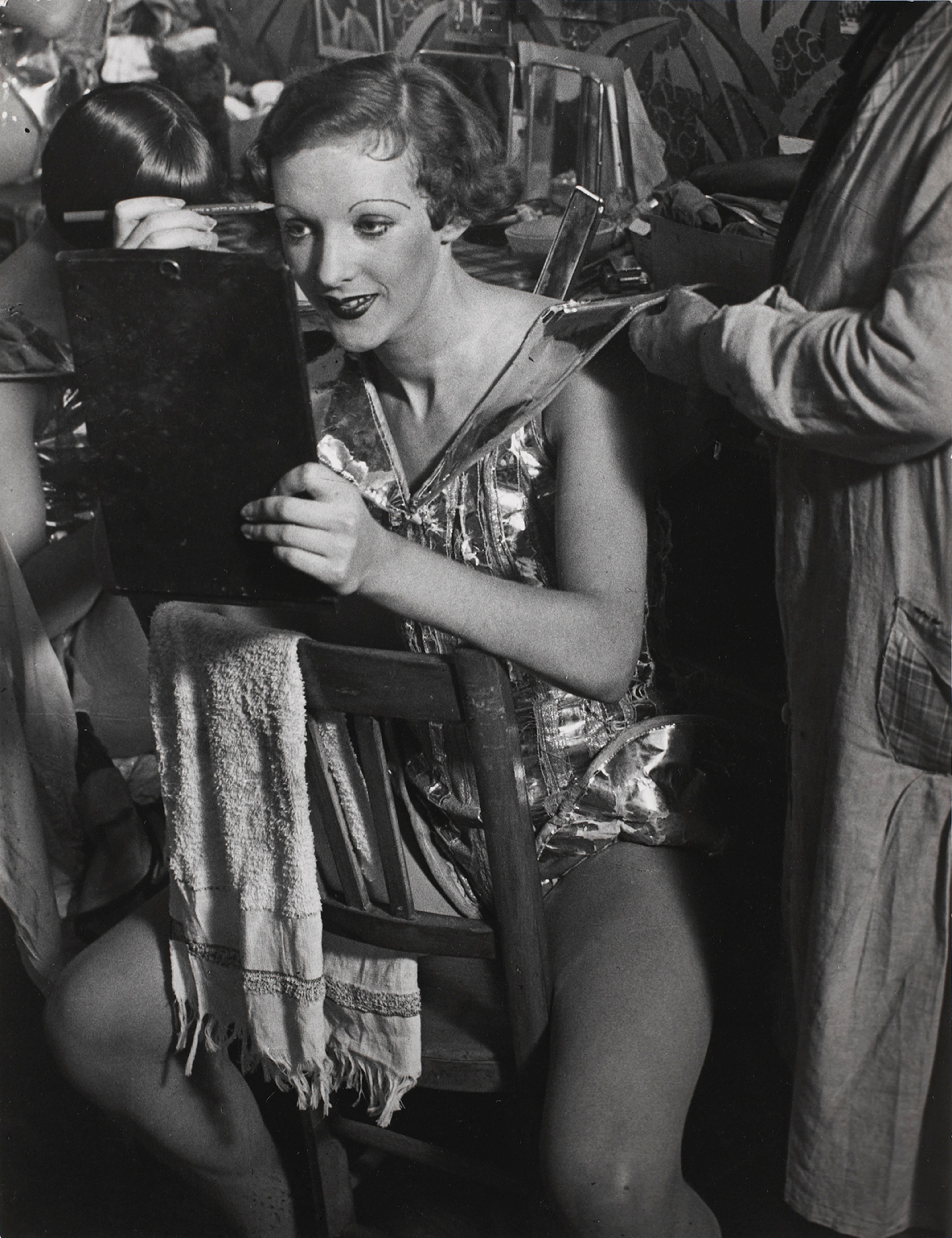 An English girl in her dressing room at the Folies-Bergere