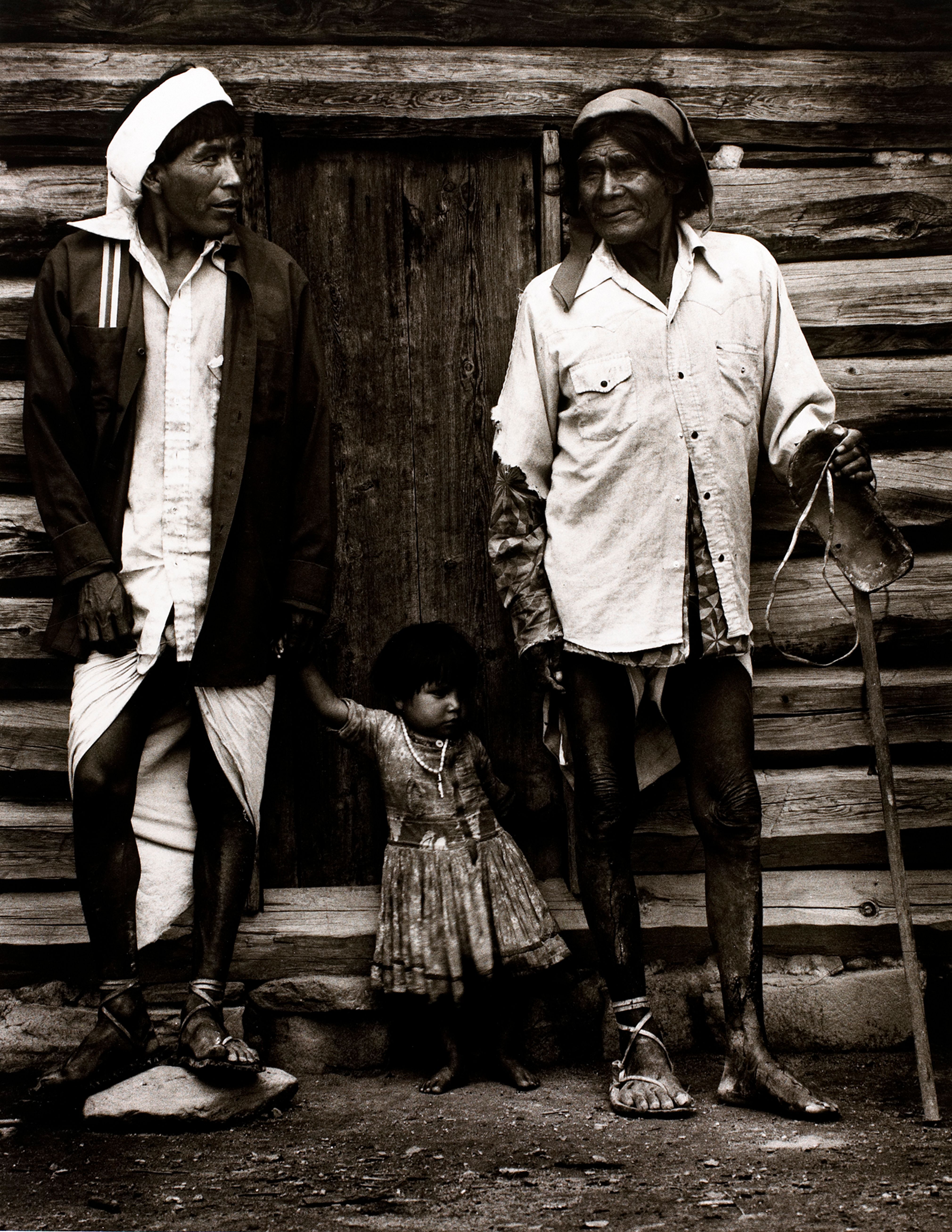 Little Girl Between Two Indians