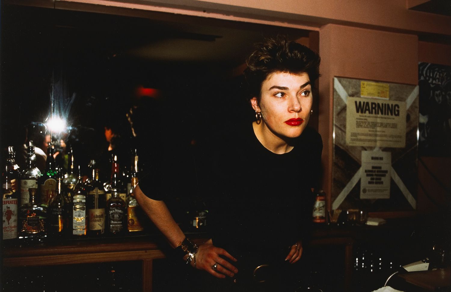 Edwige behind the bar at Evelyne’s, New York City