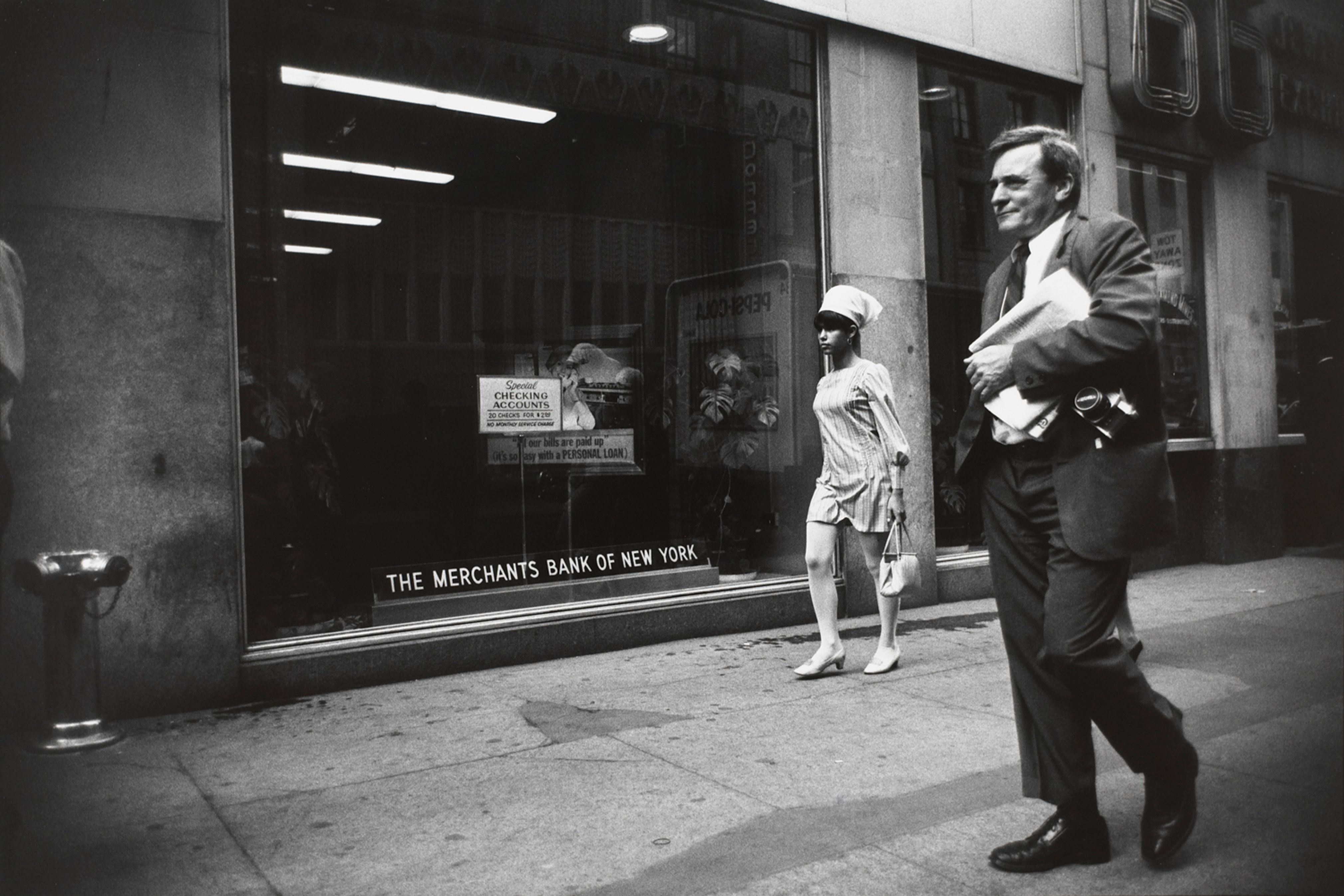 Untitled (Woman passing in front of “The Merchants Bank of New York” window)