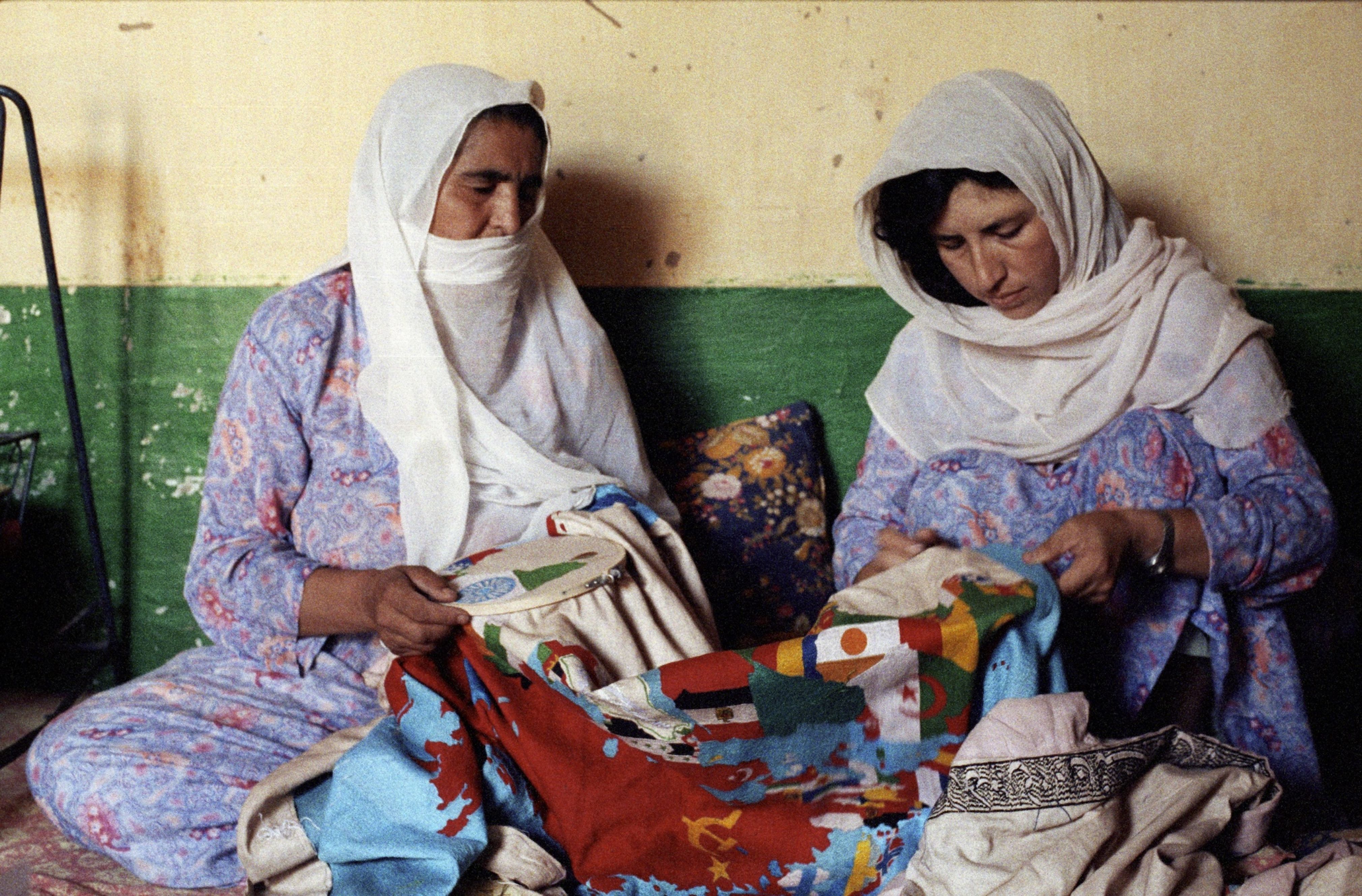 Untitled (Two women working together on a ‘Mappa’)