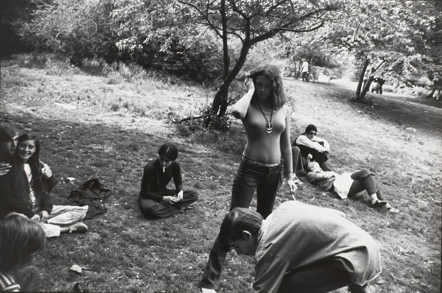 Untitled (A group of people hanging out in a park)