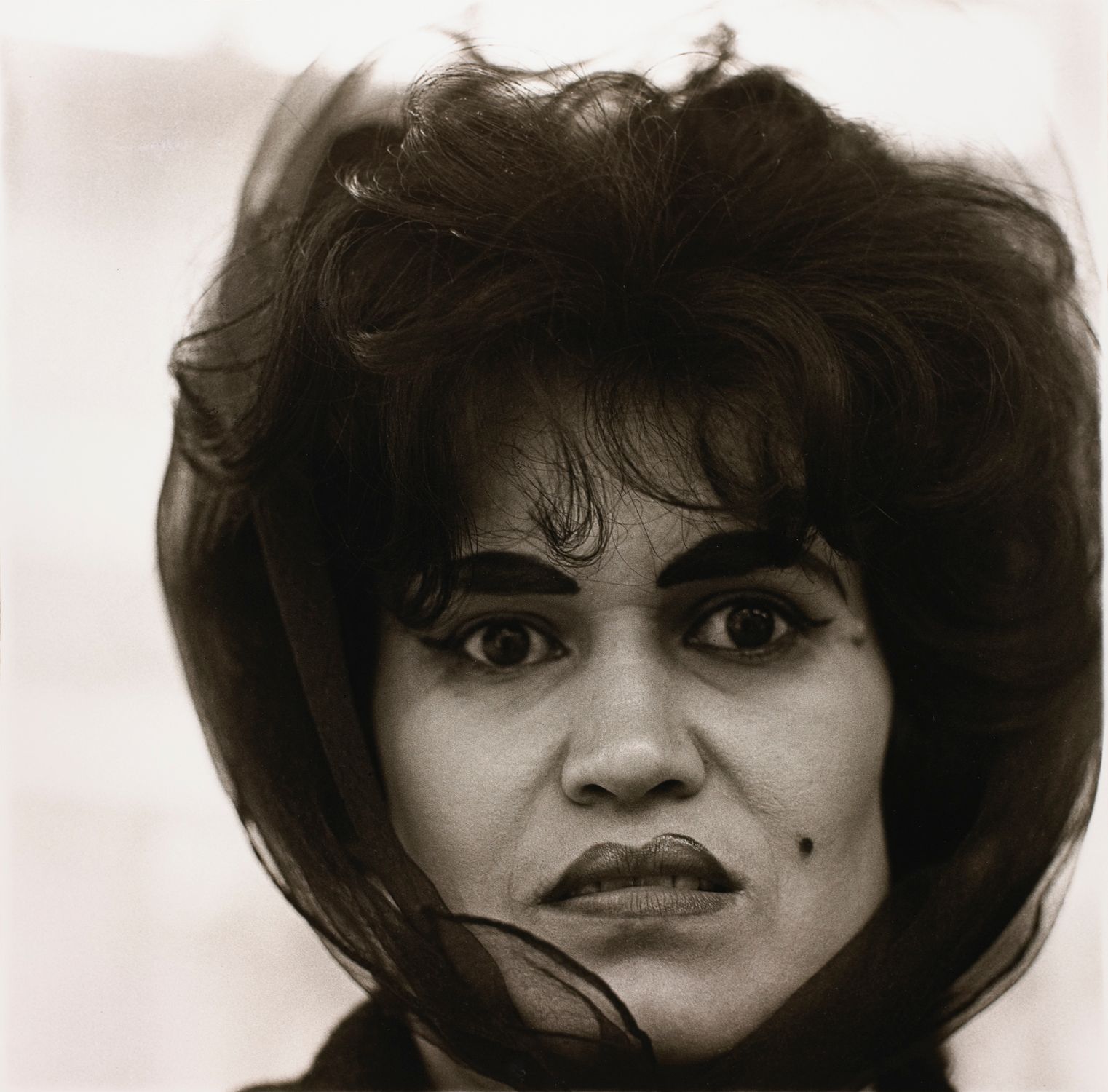 Puerto Rican woman with a beauty mark, N.Y.C.