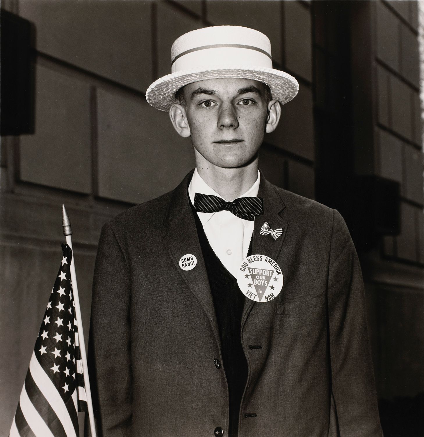 Boy with a straw hat waiting to march in a pro-war parade, N.Y.C.