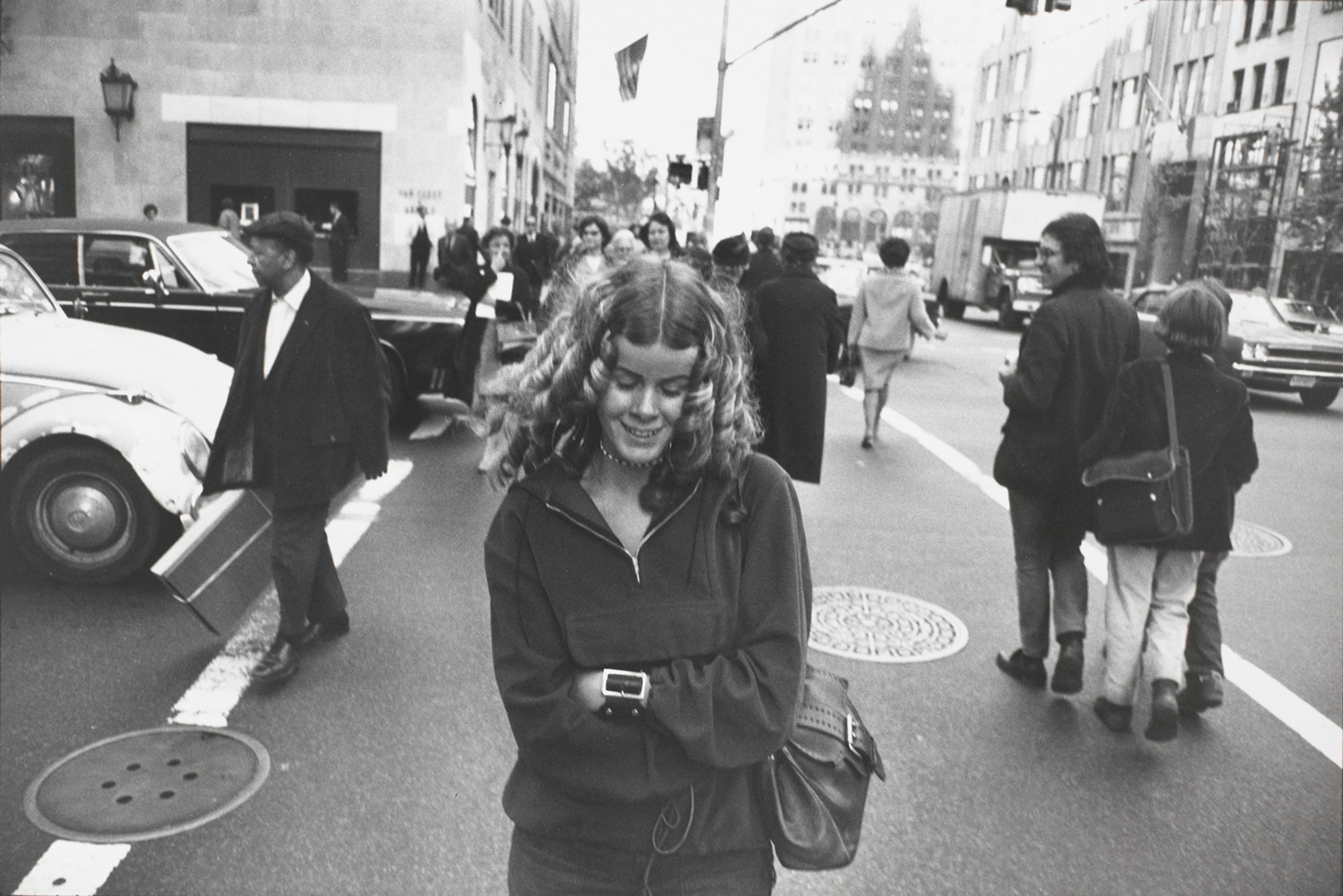 Untitled (Woman with coiled curls crossing street, downtown Manhattan)