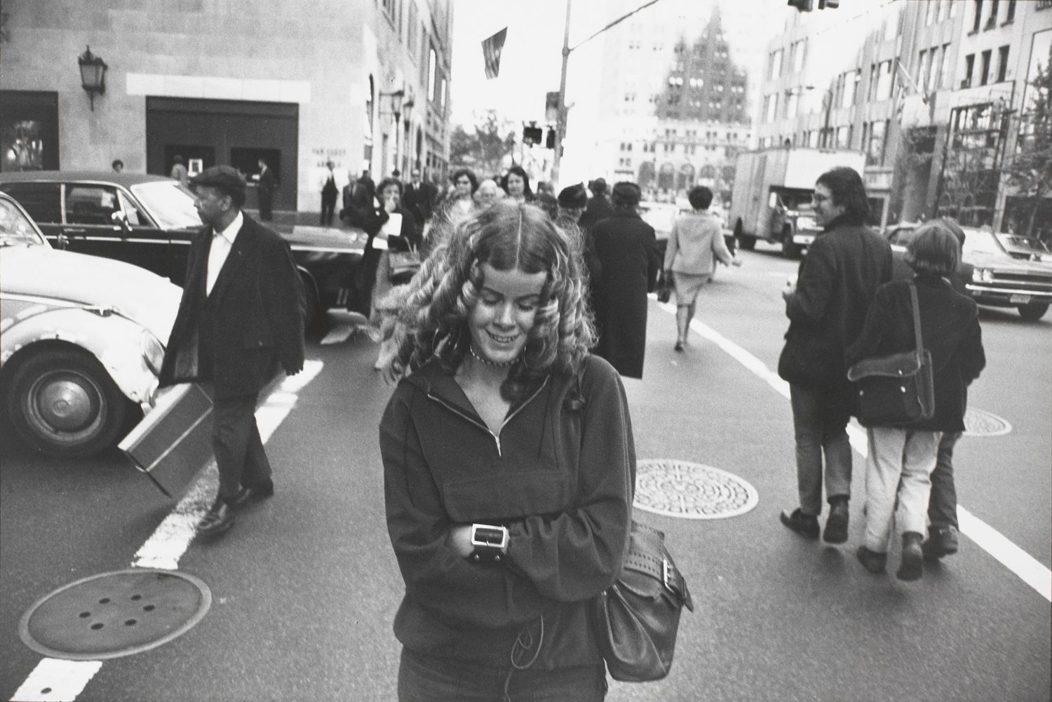 Untitled (Woman with coiled curls crossing street, downtown Manhattan)