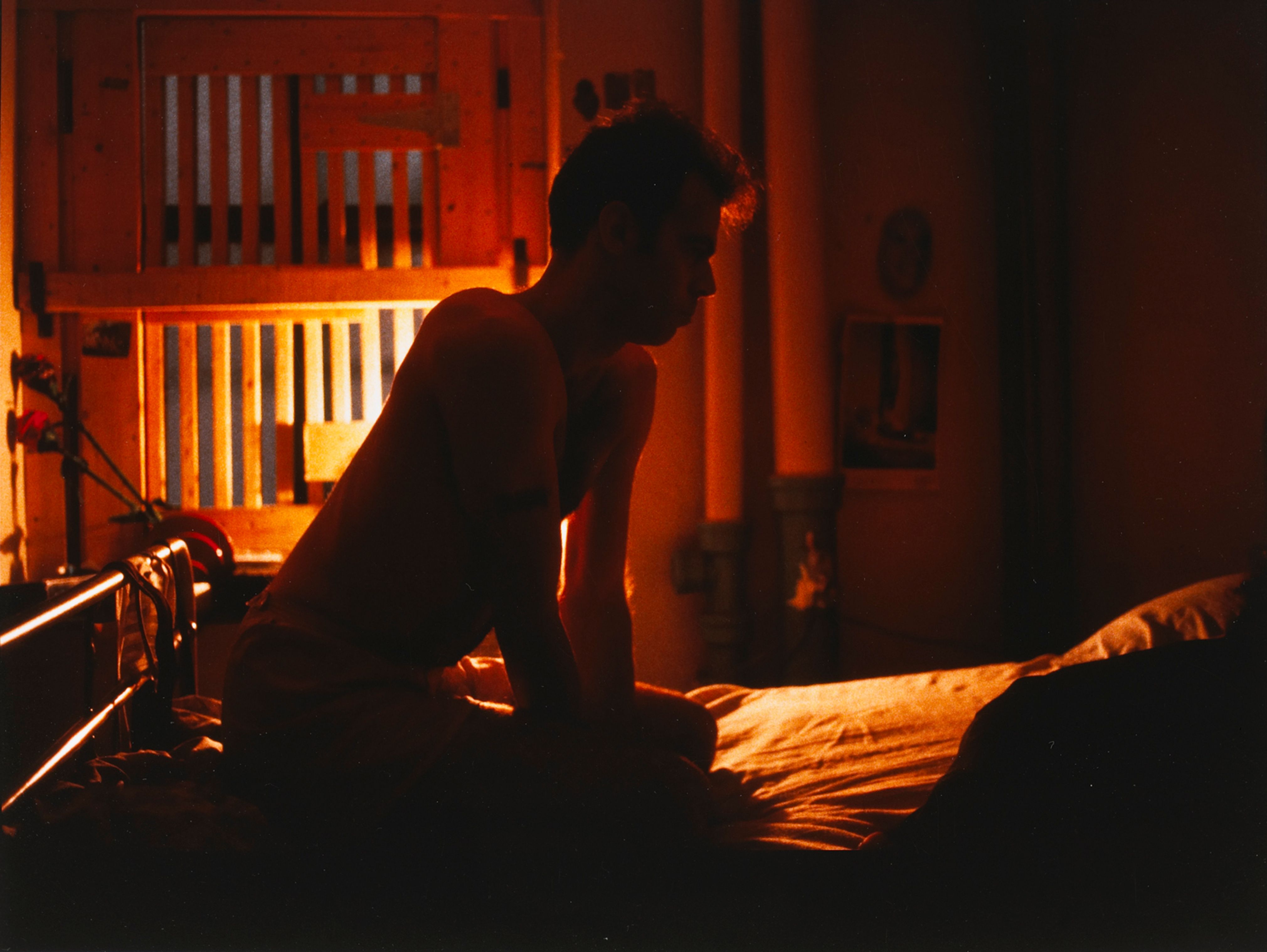 Brian on my bed with bars, New York City