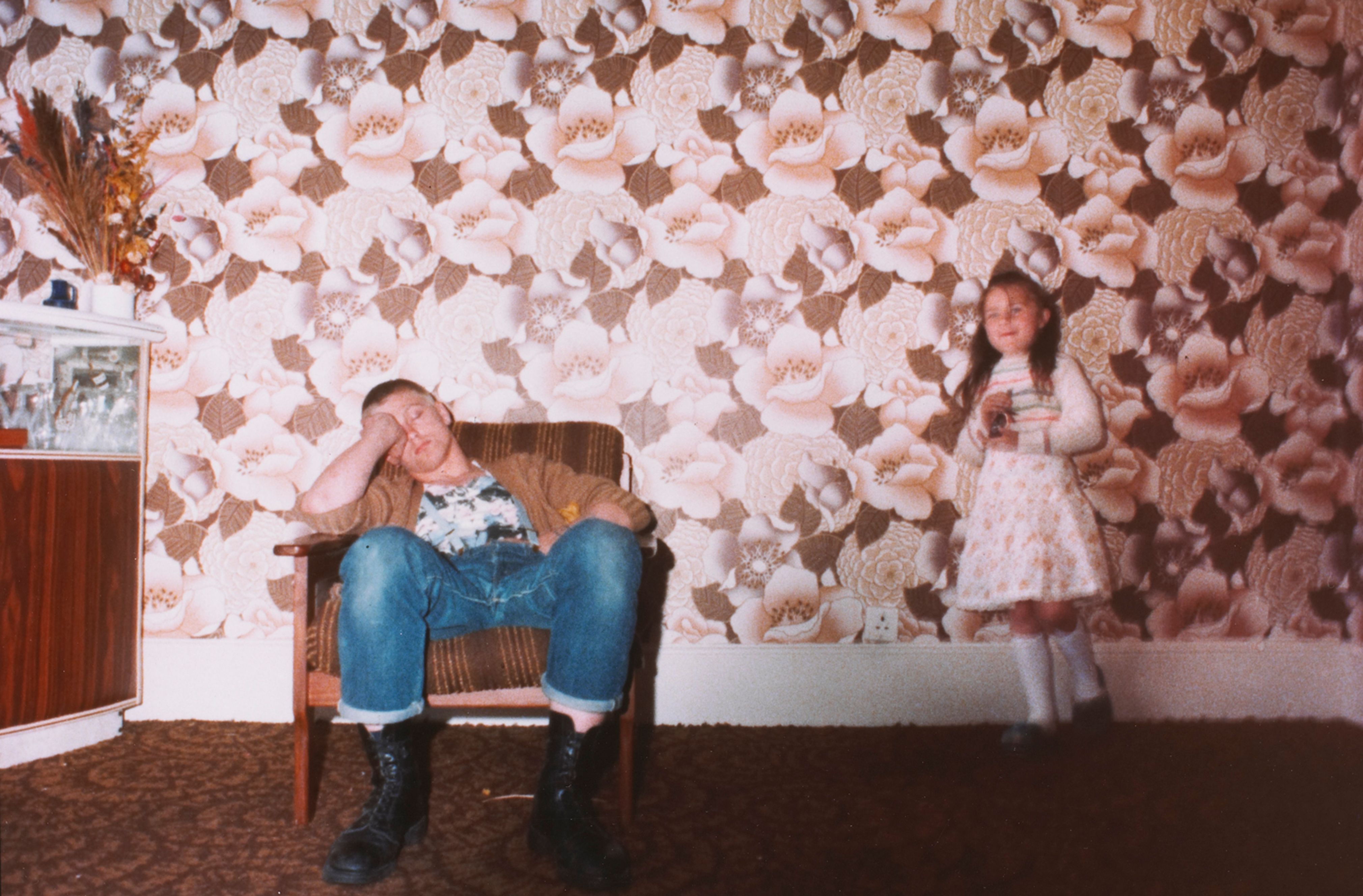 Skinhead with child, London