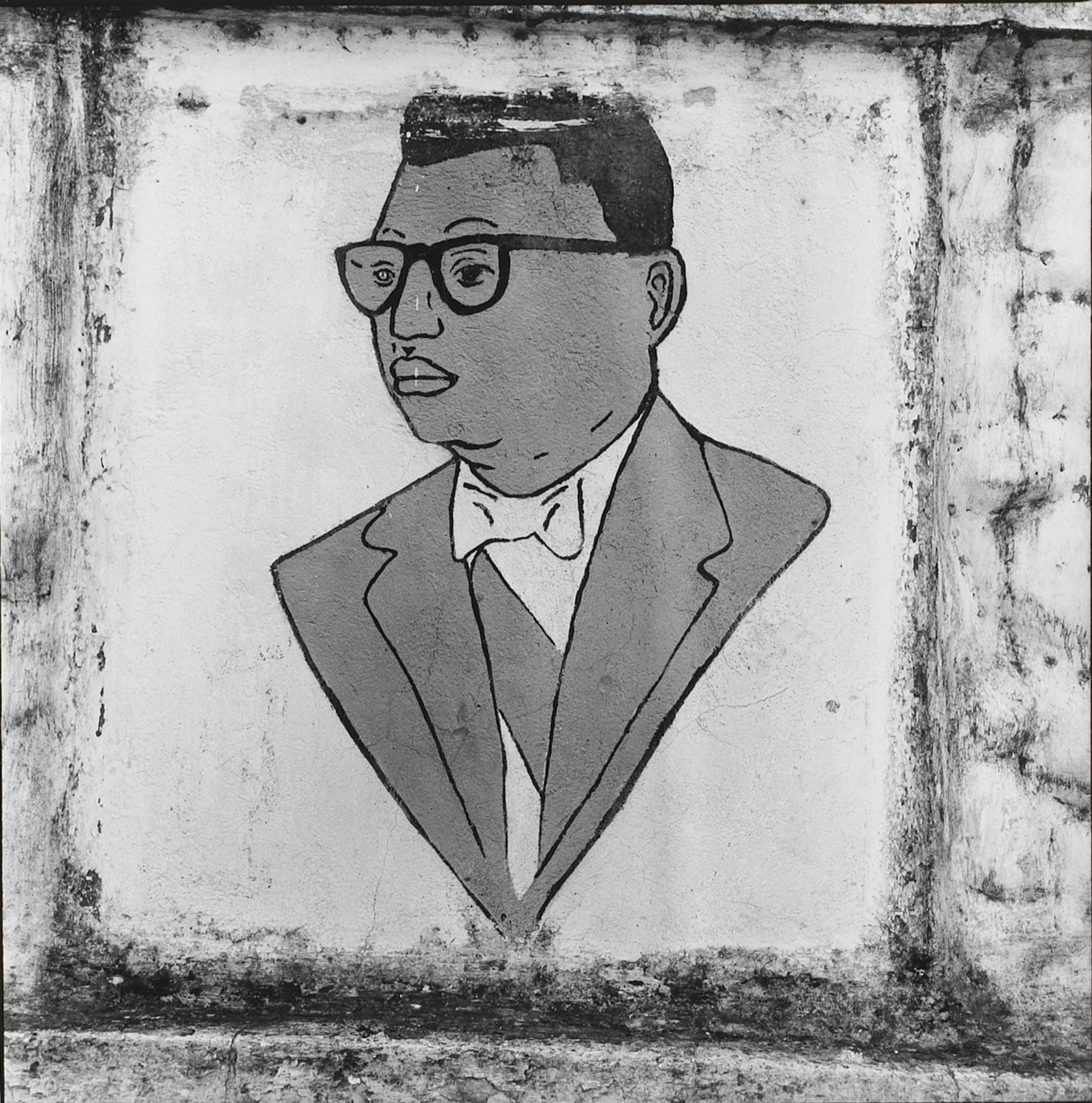 Papa Doc. Defaced mural in Léogâne
