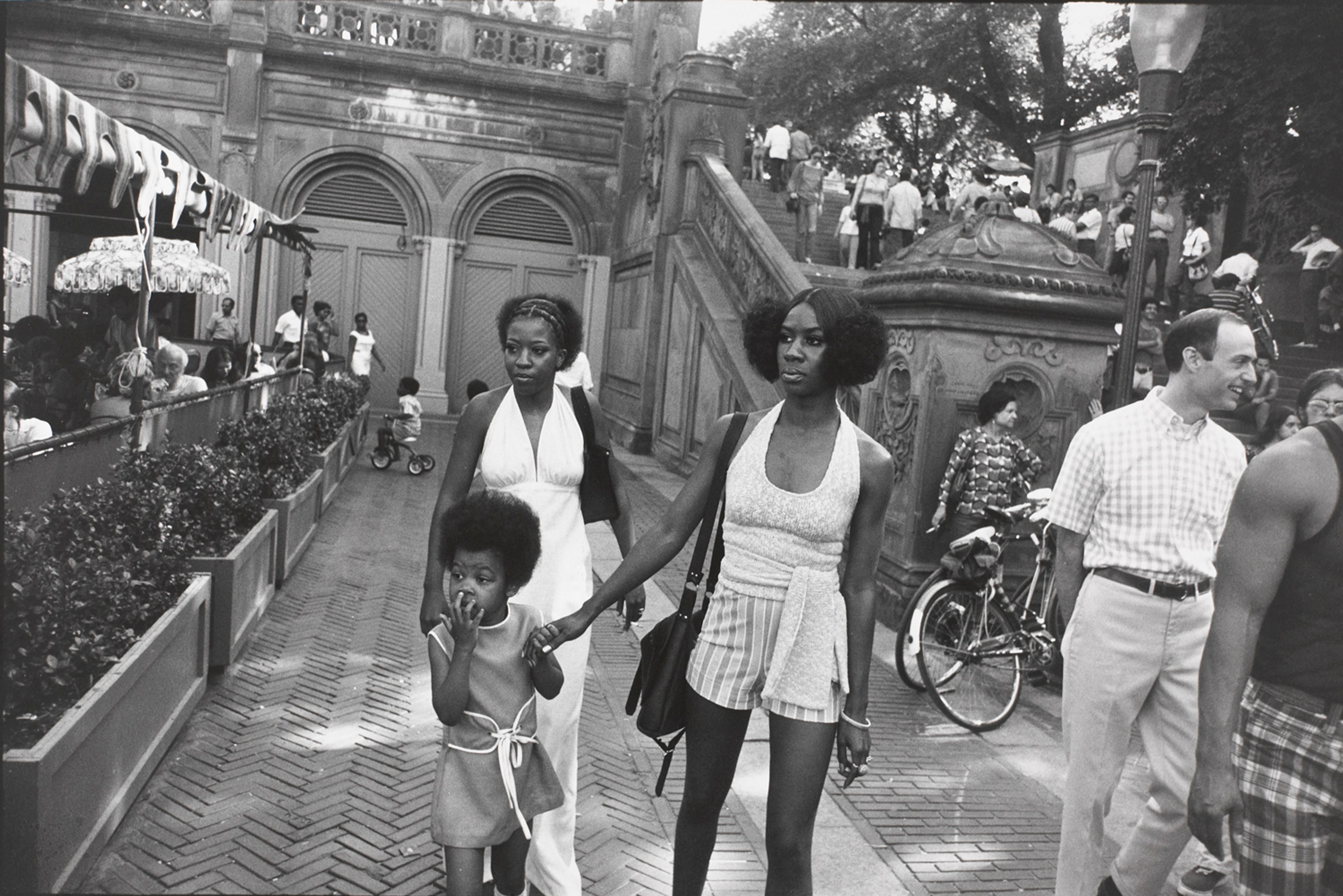 Untitled (Two women, one holding a young girl’s hand)