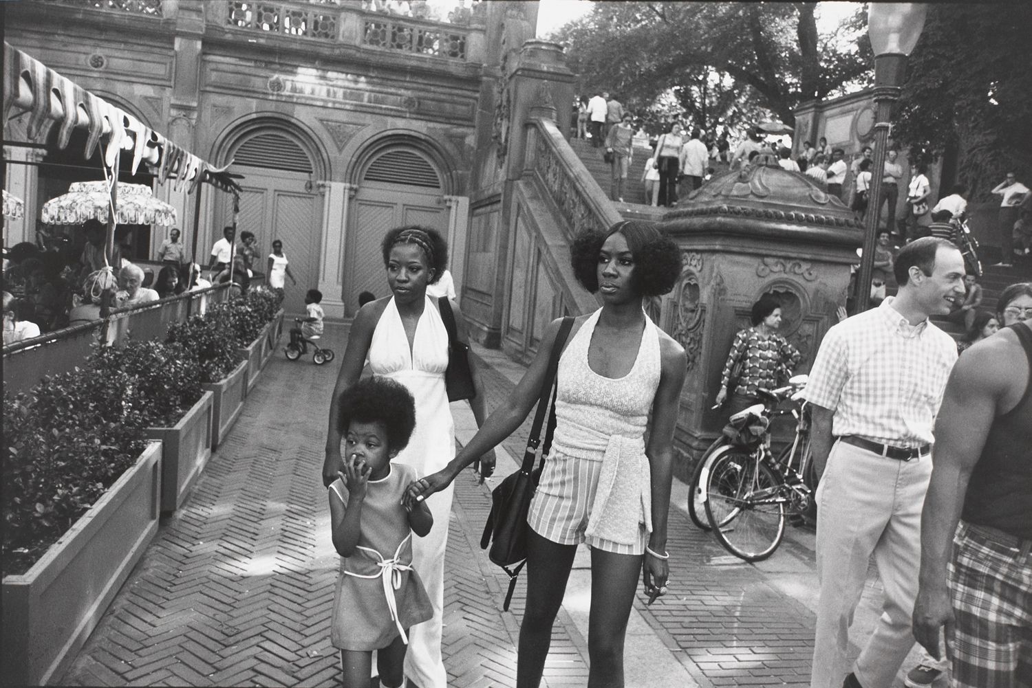 Untitled (Two women, one holding a young girl’s hand)