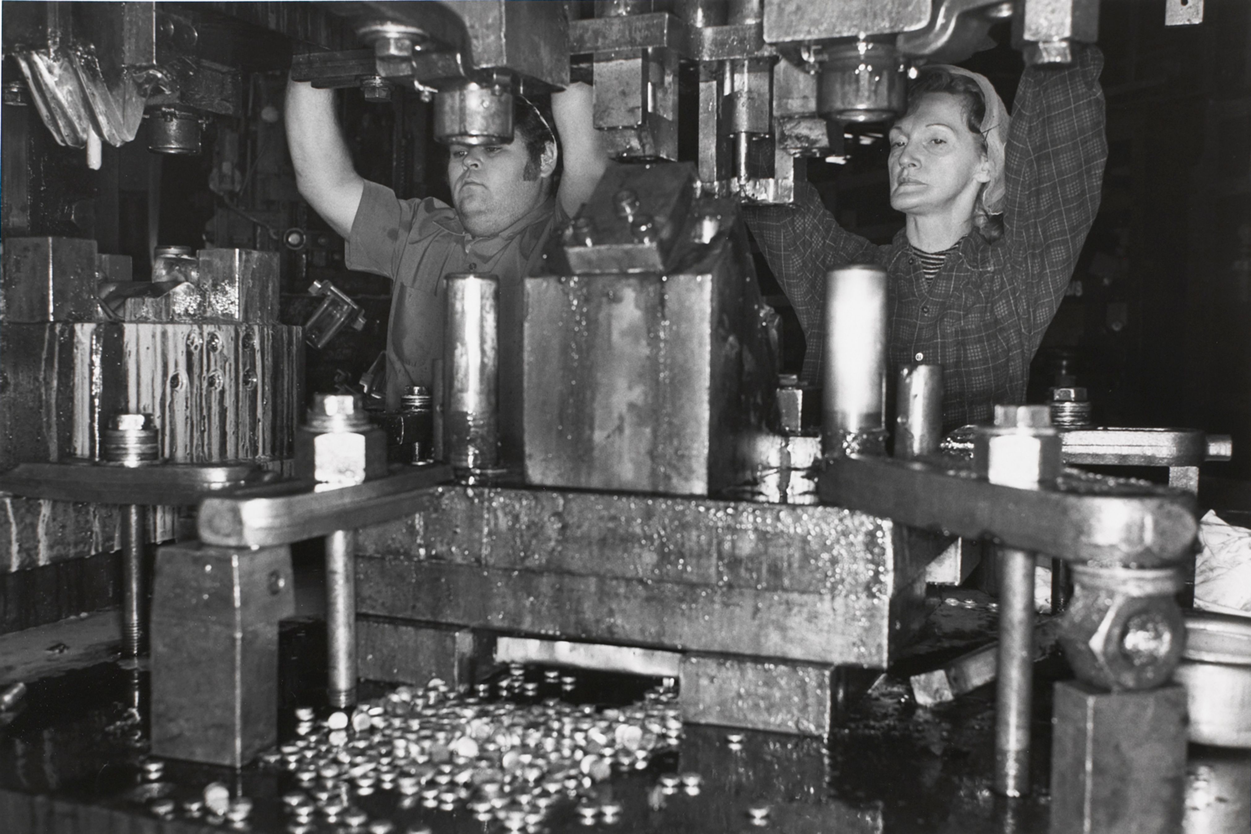 AKRON, OHIO (man and woman working together)