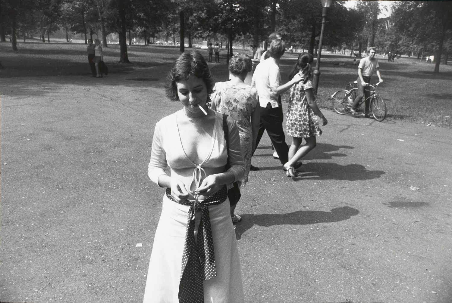 Untitled (Woman in a v-cut top with cigarette)